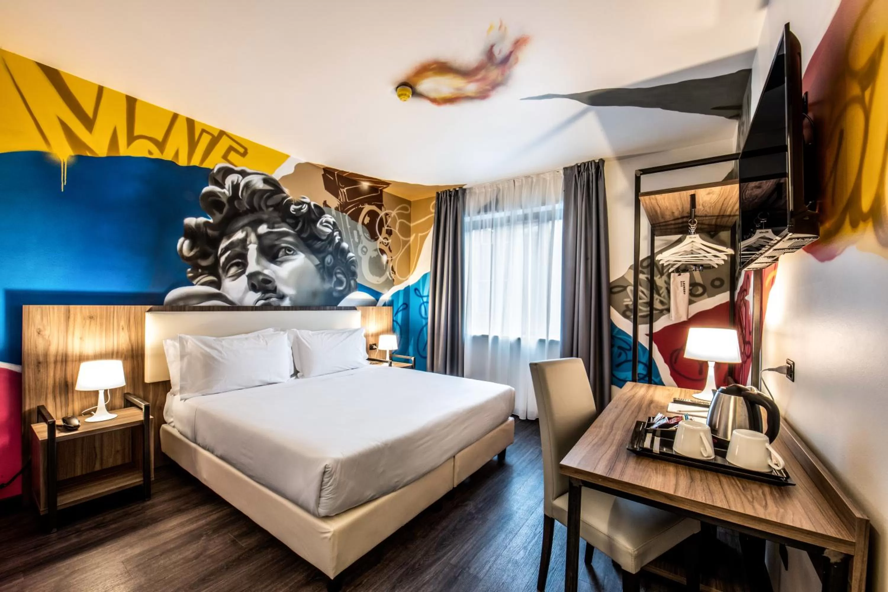 Bed in Muraless Art Hotel - WorldHotels Crafted