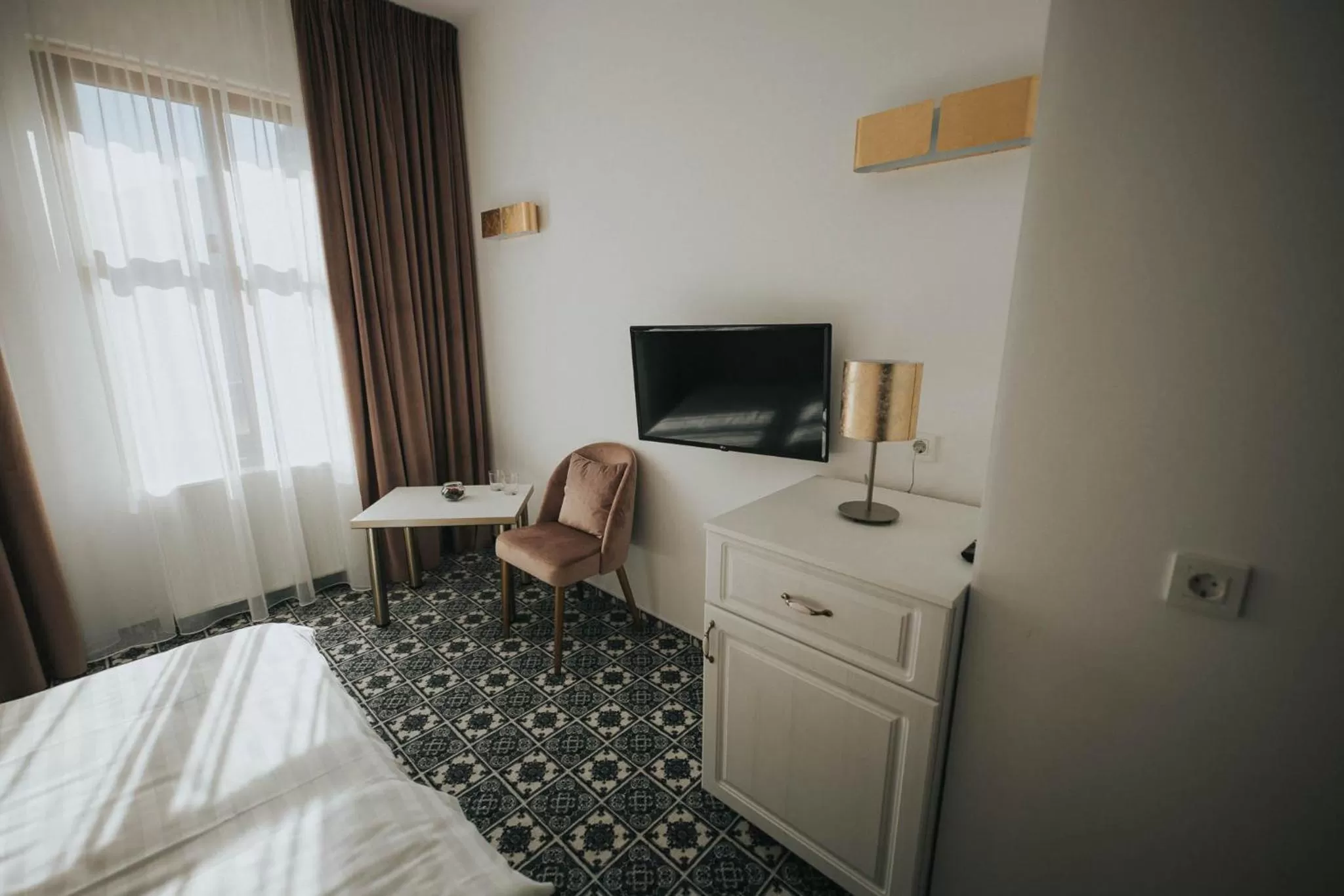 TV and multimedia, TV/Entertainment Center in Hotel Marabella