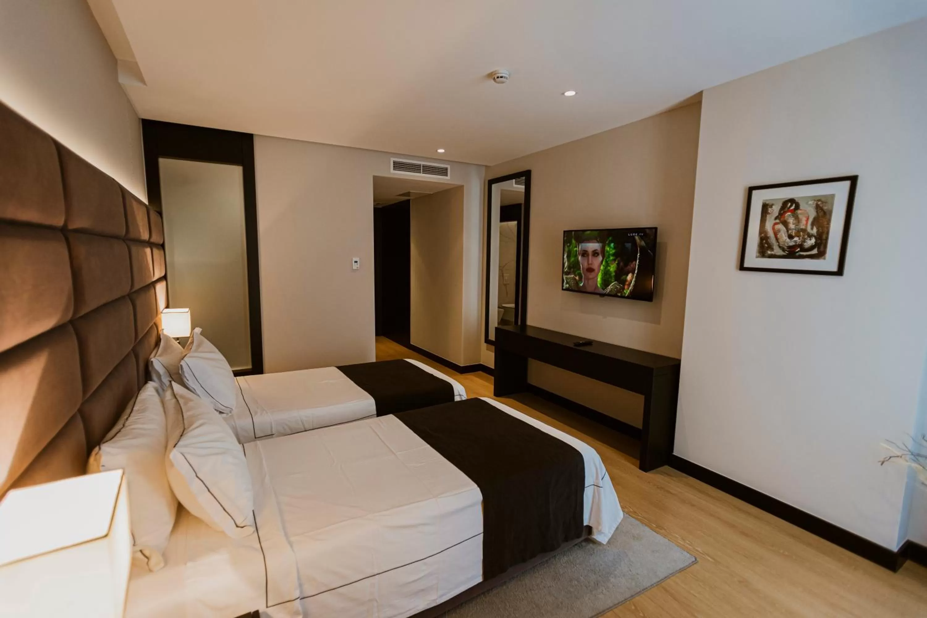 Bed in Privilege Hotel & Spa