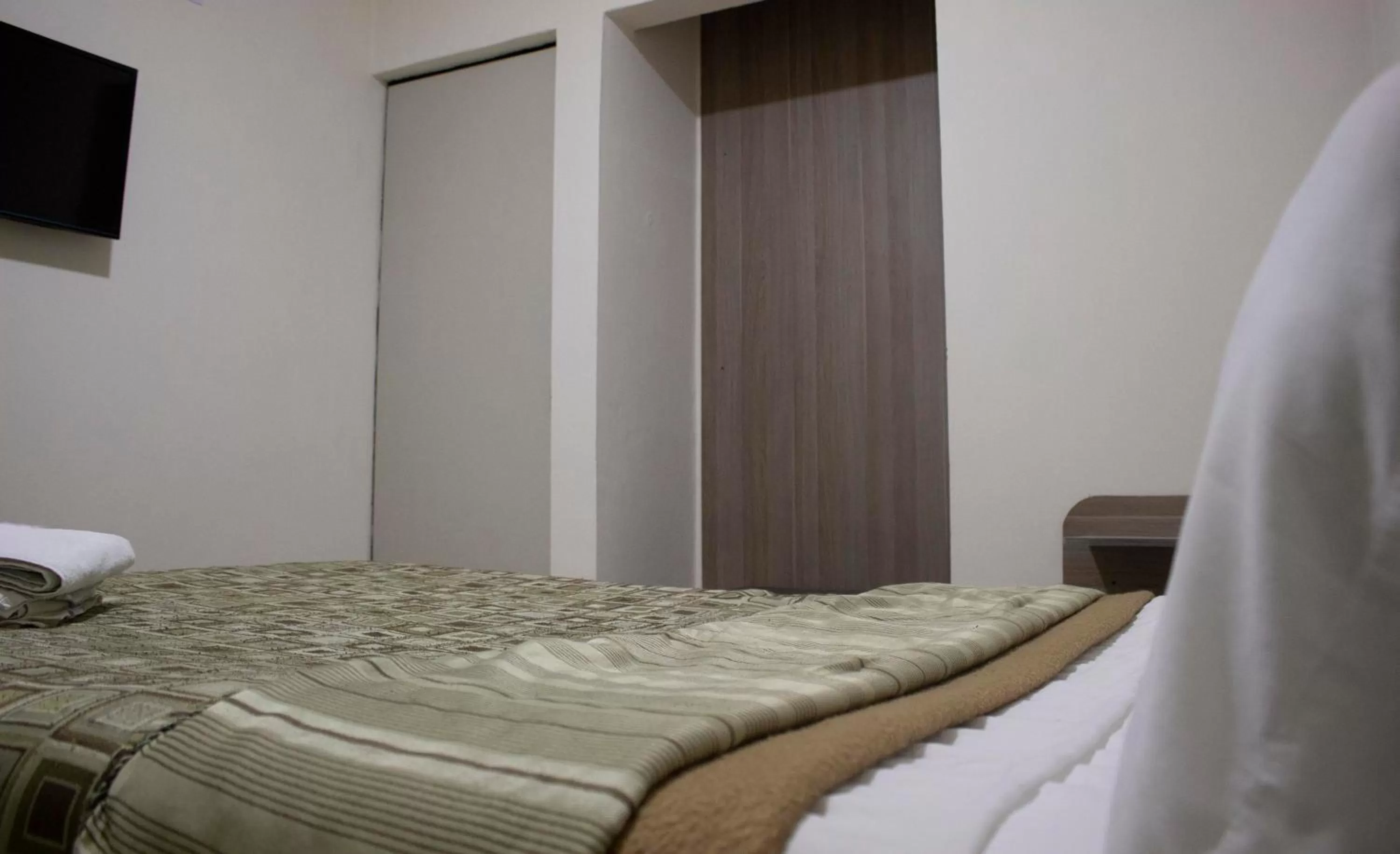 Bed in Hotel Winn Comfort