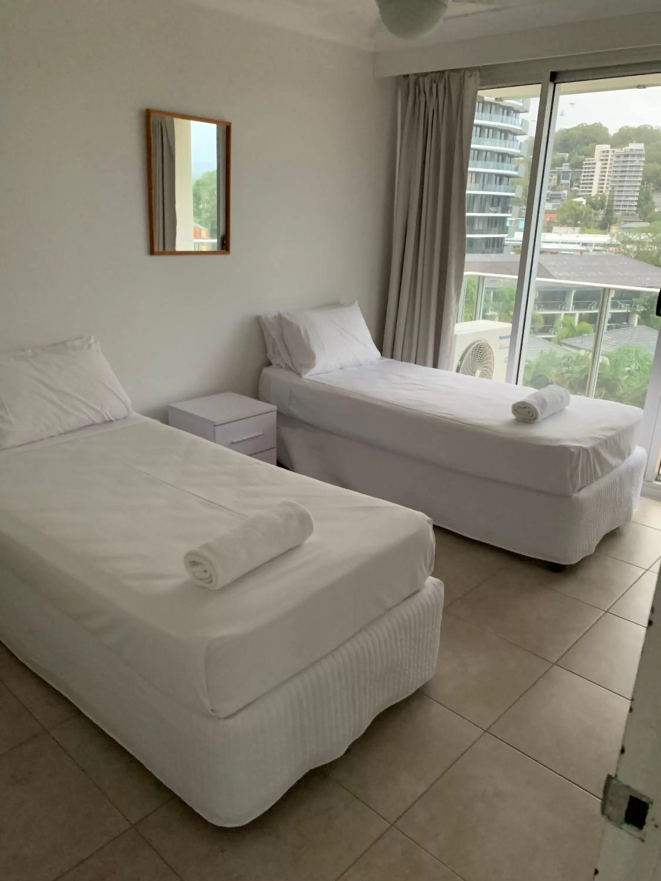 Bedroom, Bed in Pacific Regis Beachfront Holiday Apartments