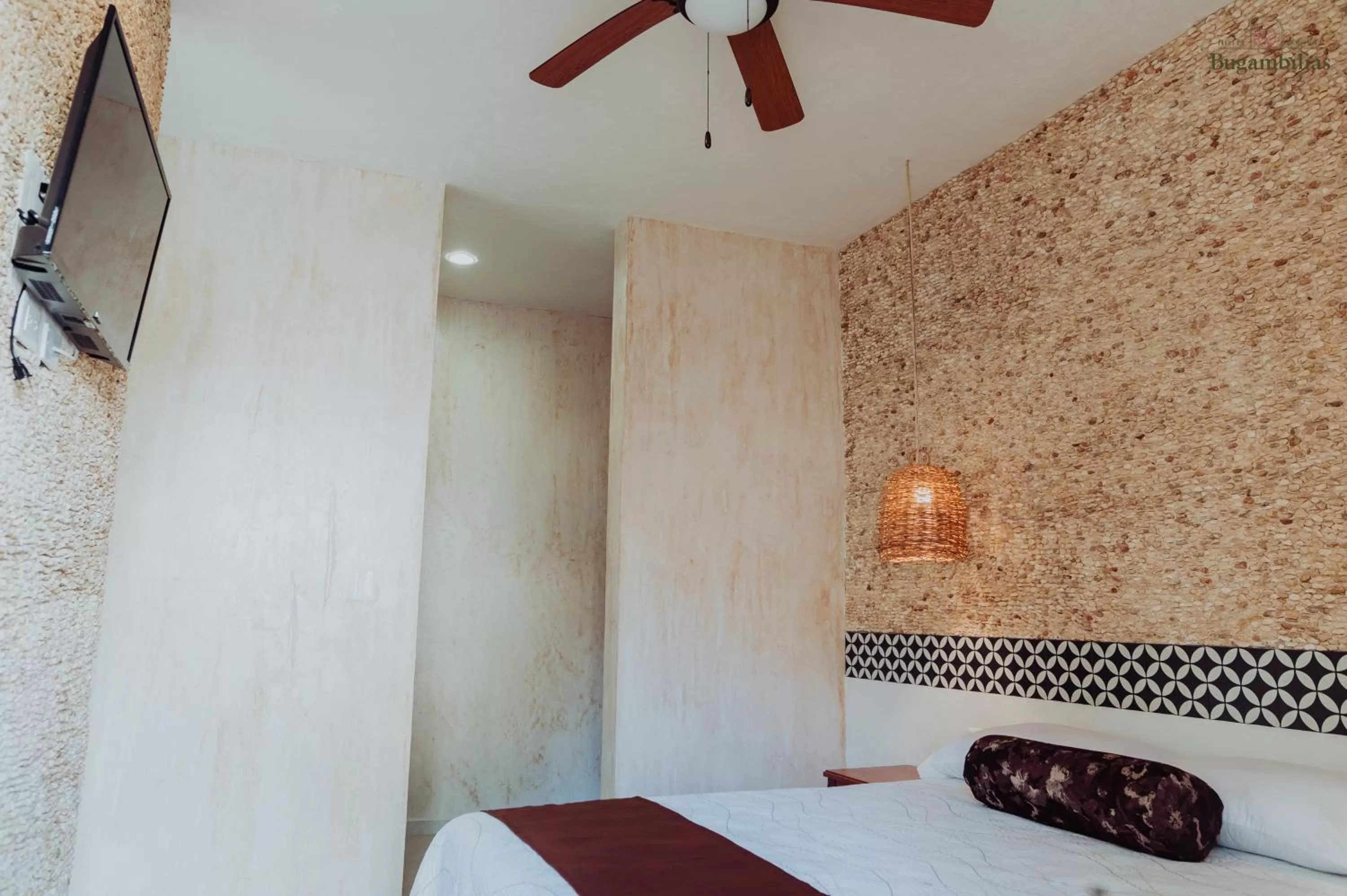 Bed in Hotel Boutique Bugambilias