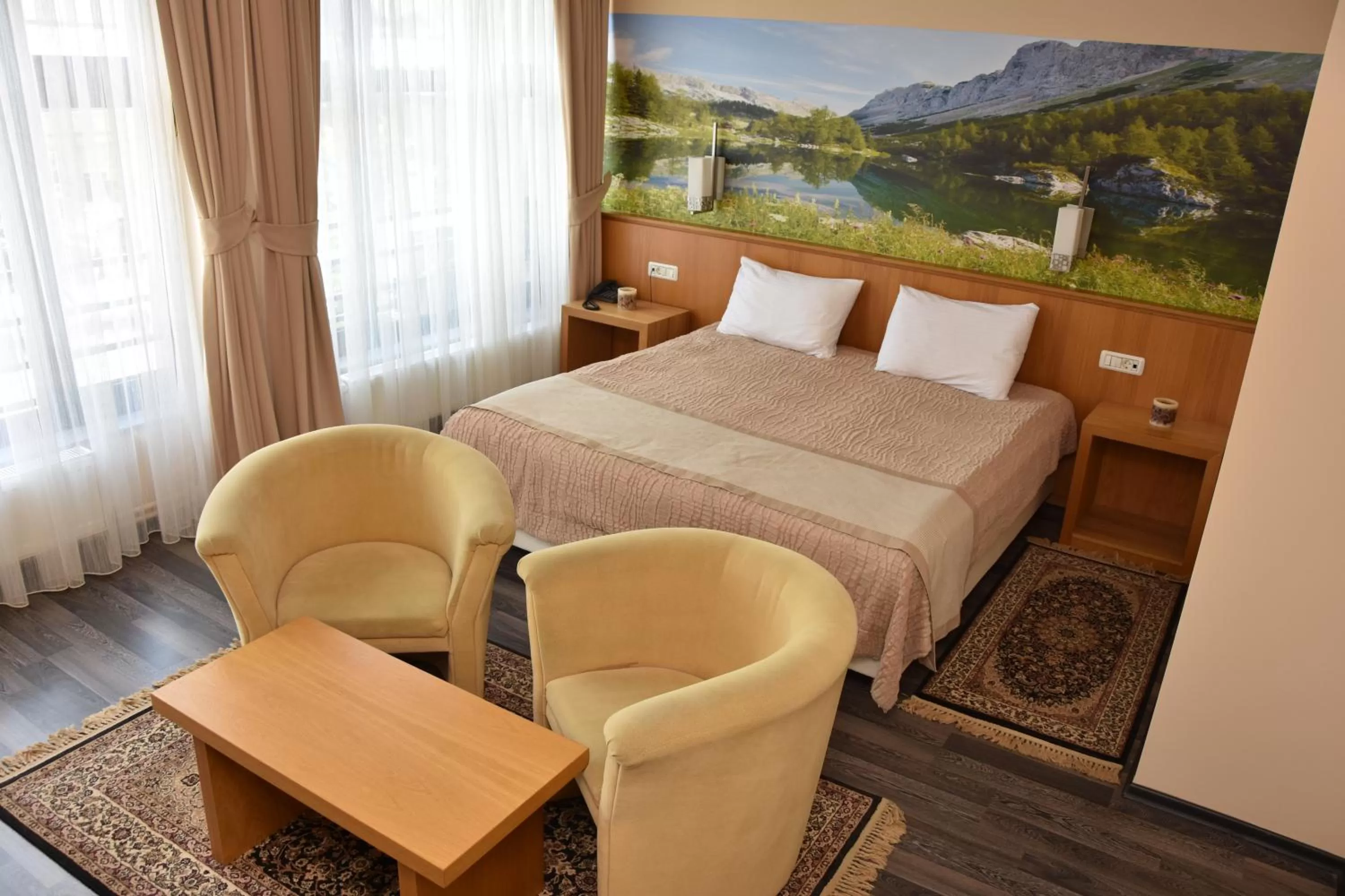 Seating area, Bed in Hotel Lirak