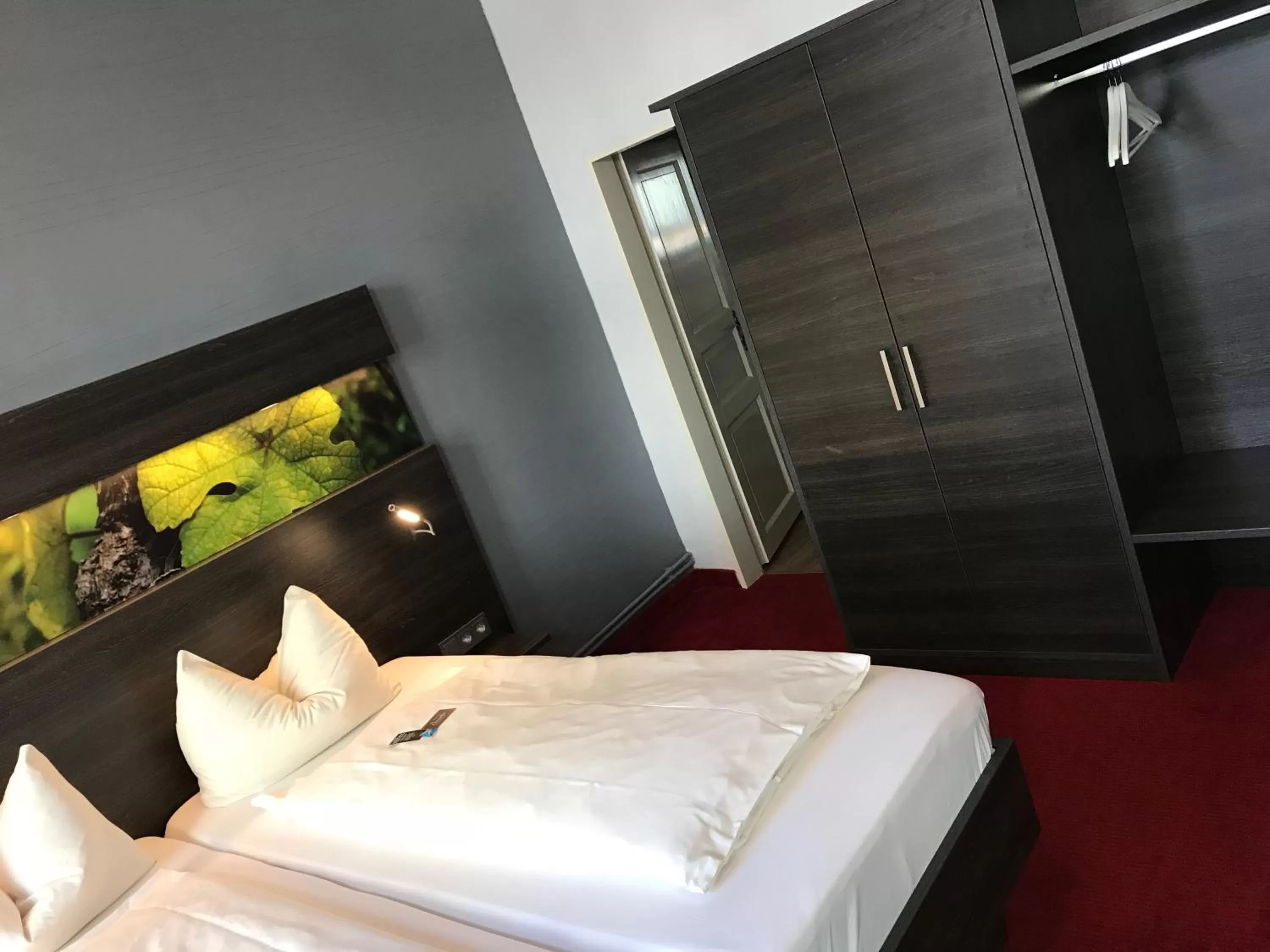 Bed in Stadthotel-Garni Smutje