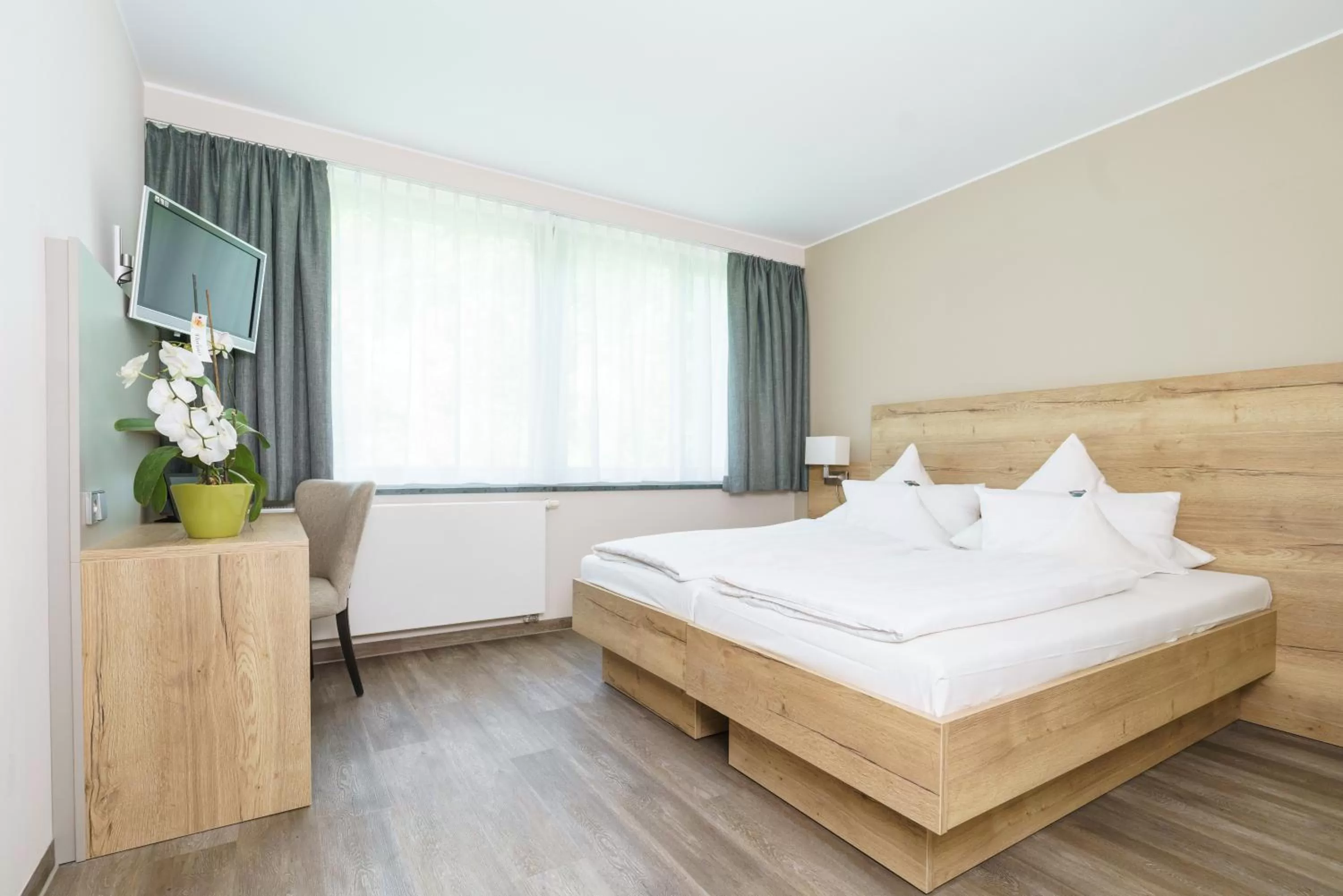 Bed in Hotel Forsthaus Grüna Betreibergesellschaft mbH