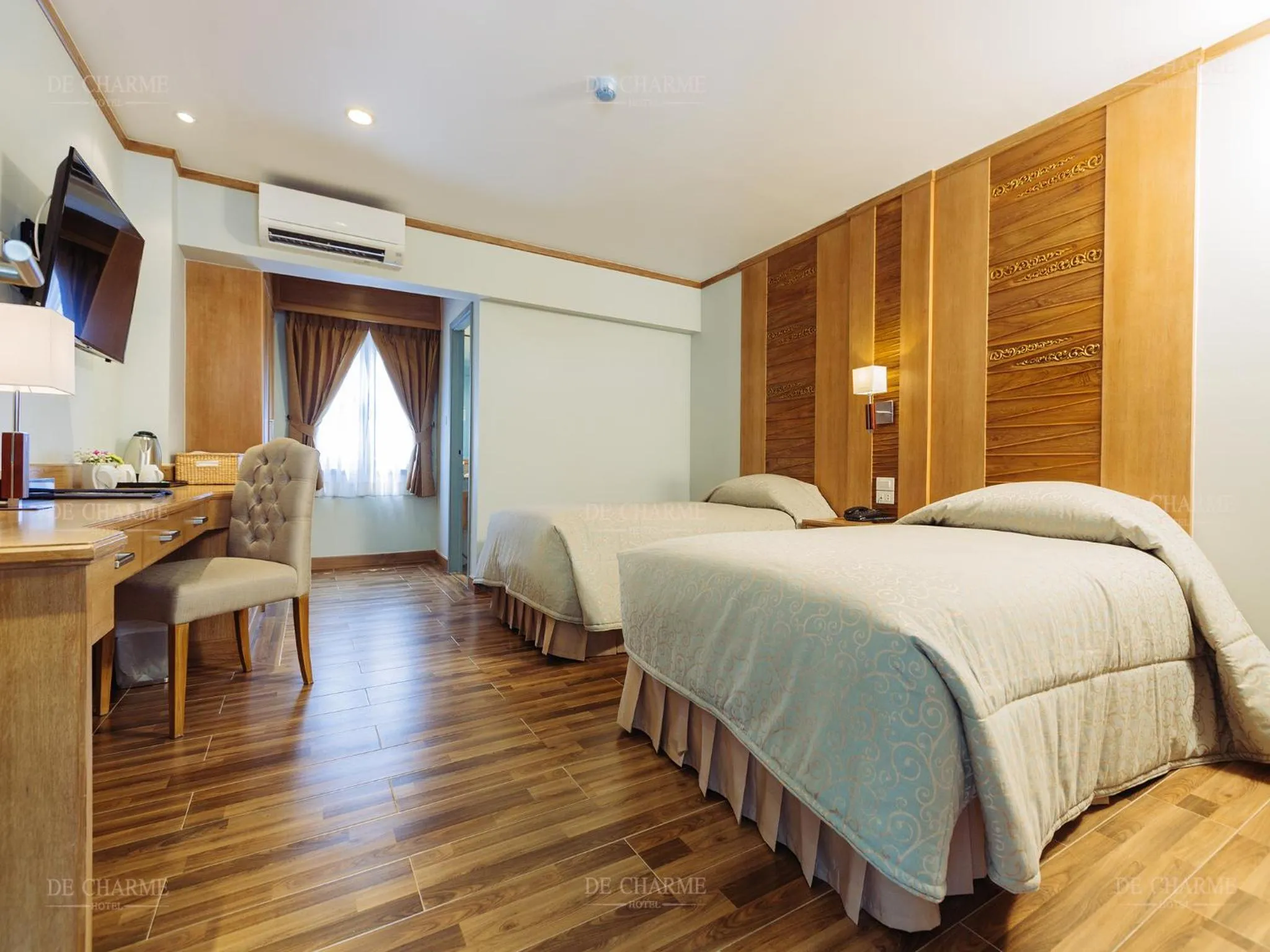 Bed in Decharme Hotel