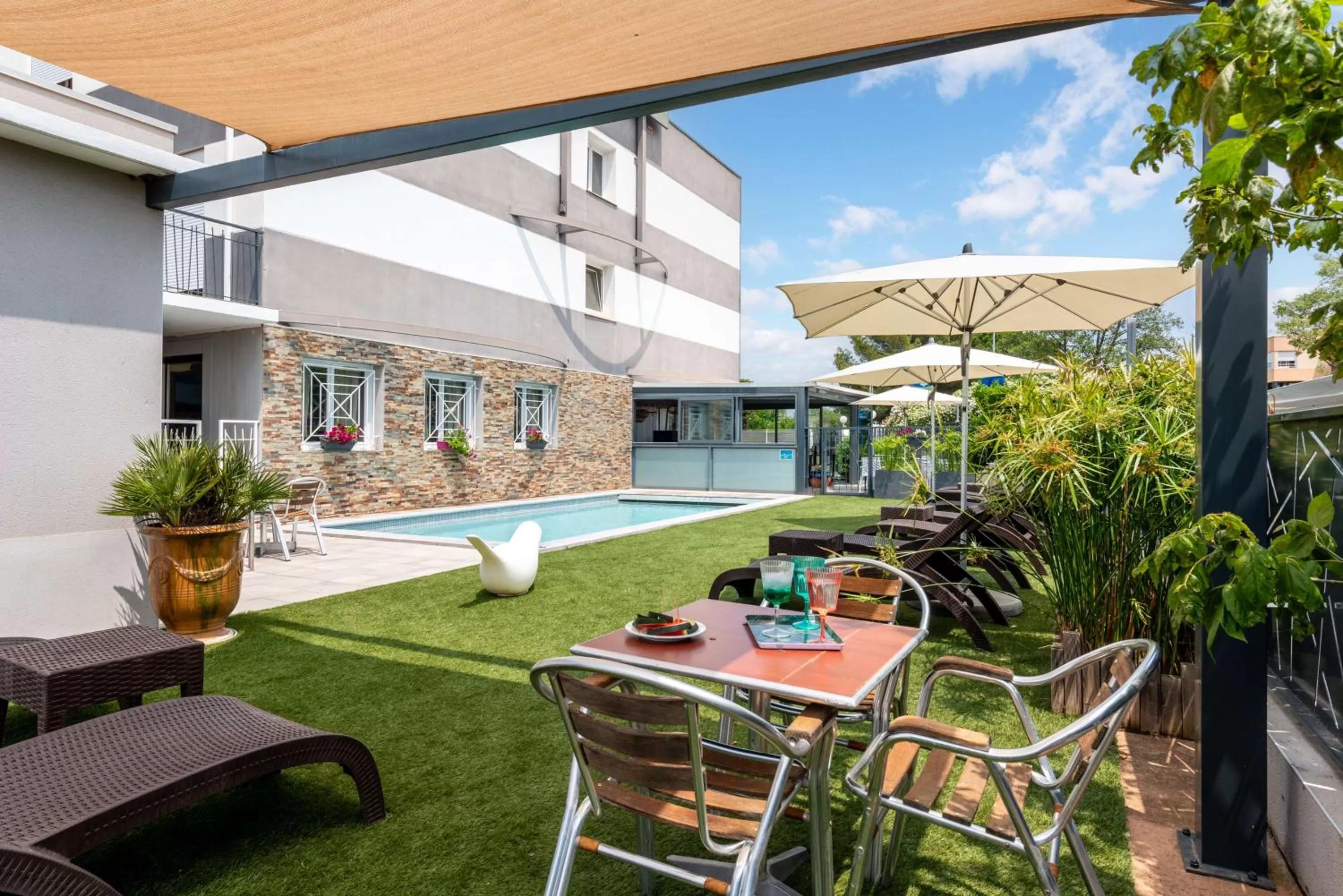 Pool view in Sure Hotel by Best Western Beziers Le Monestie