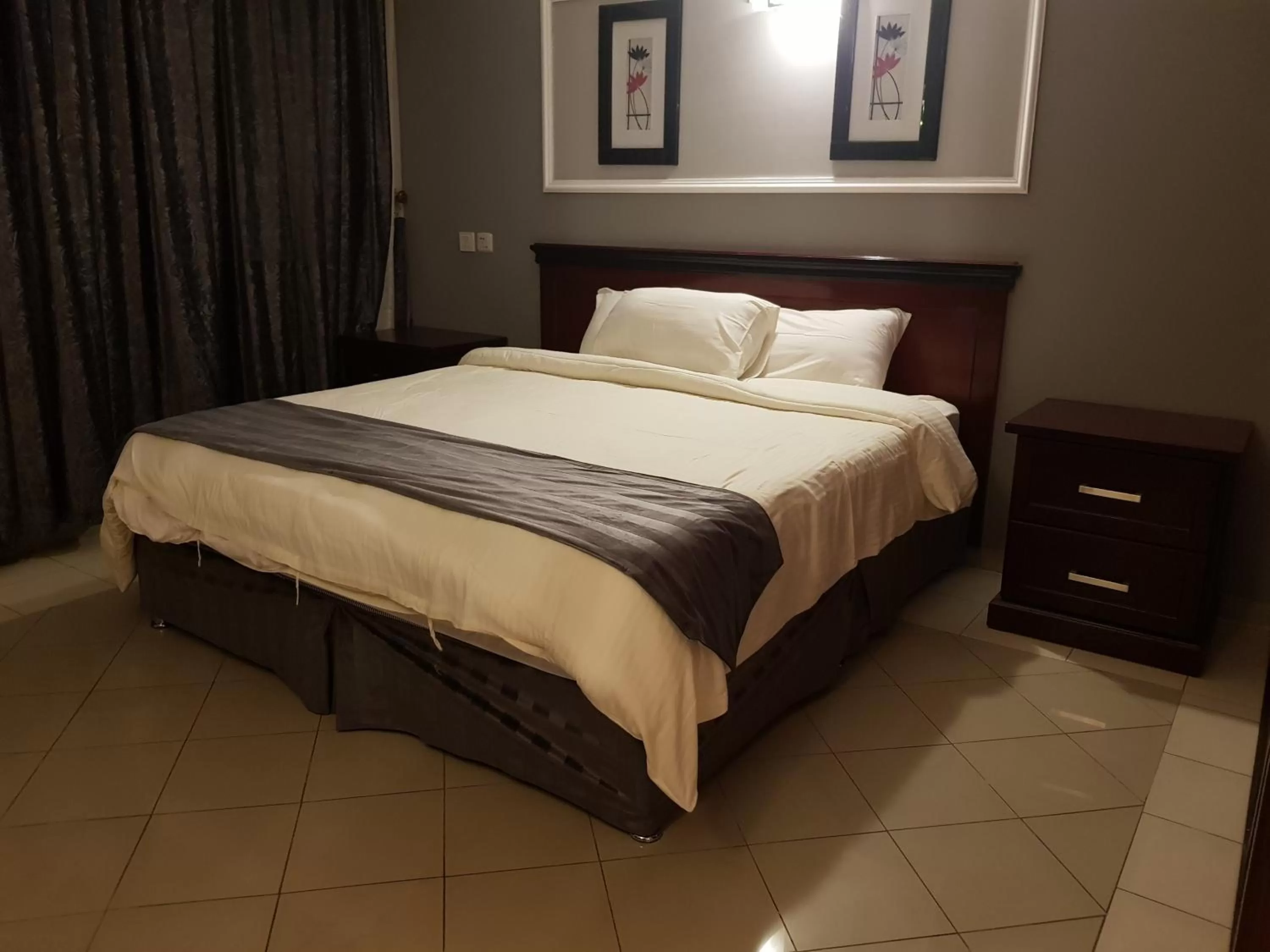 Bed in Almeswari Suites