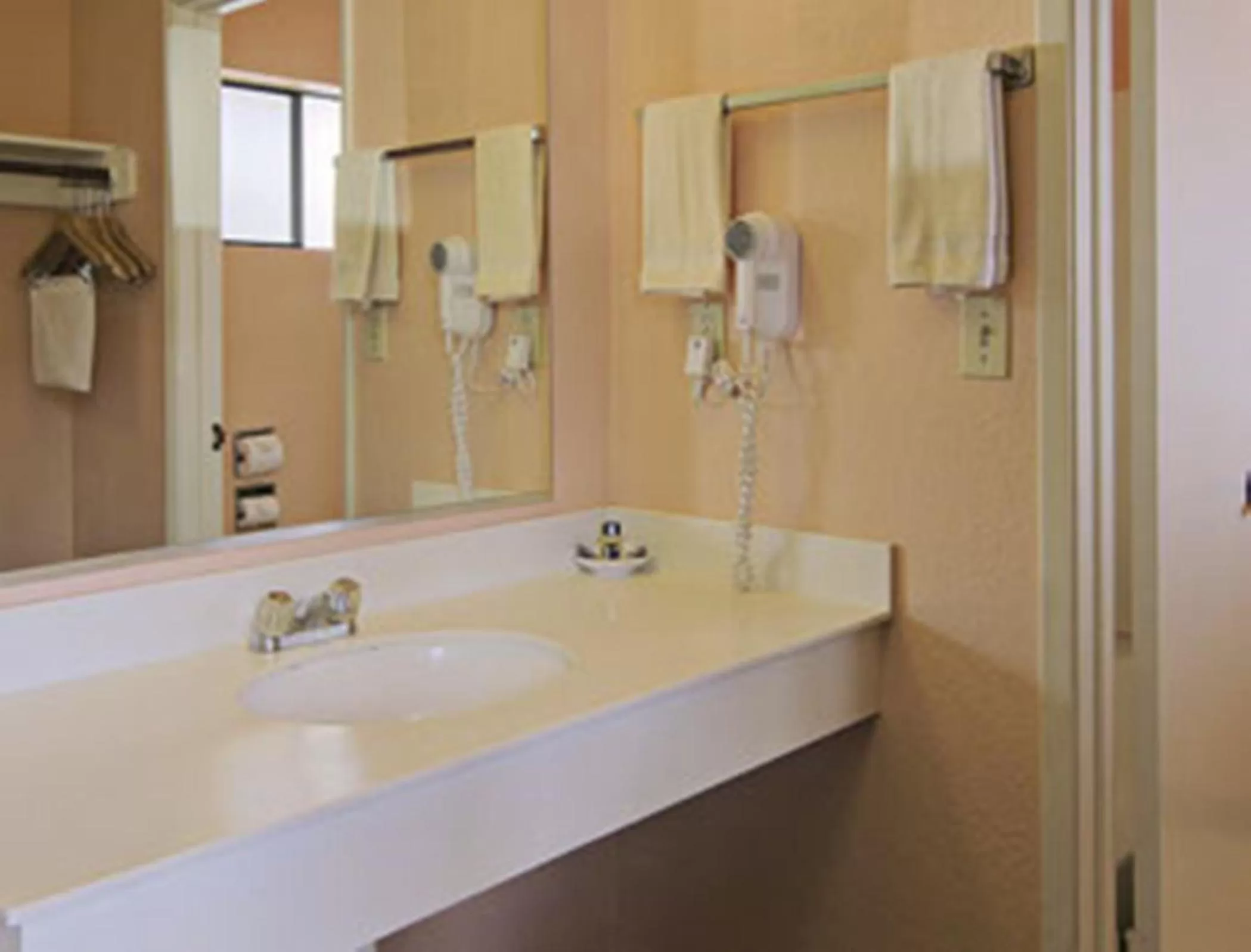 Toilet in Travelodge by Wyndham Turlock