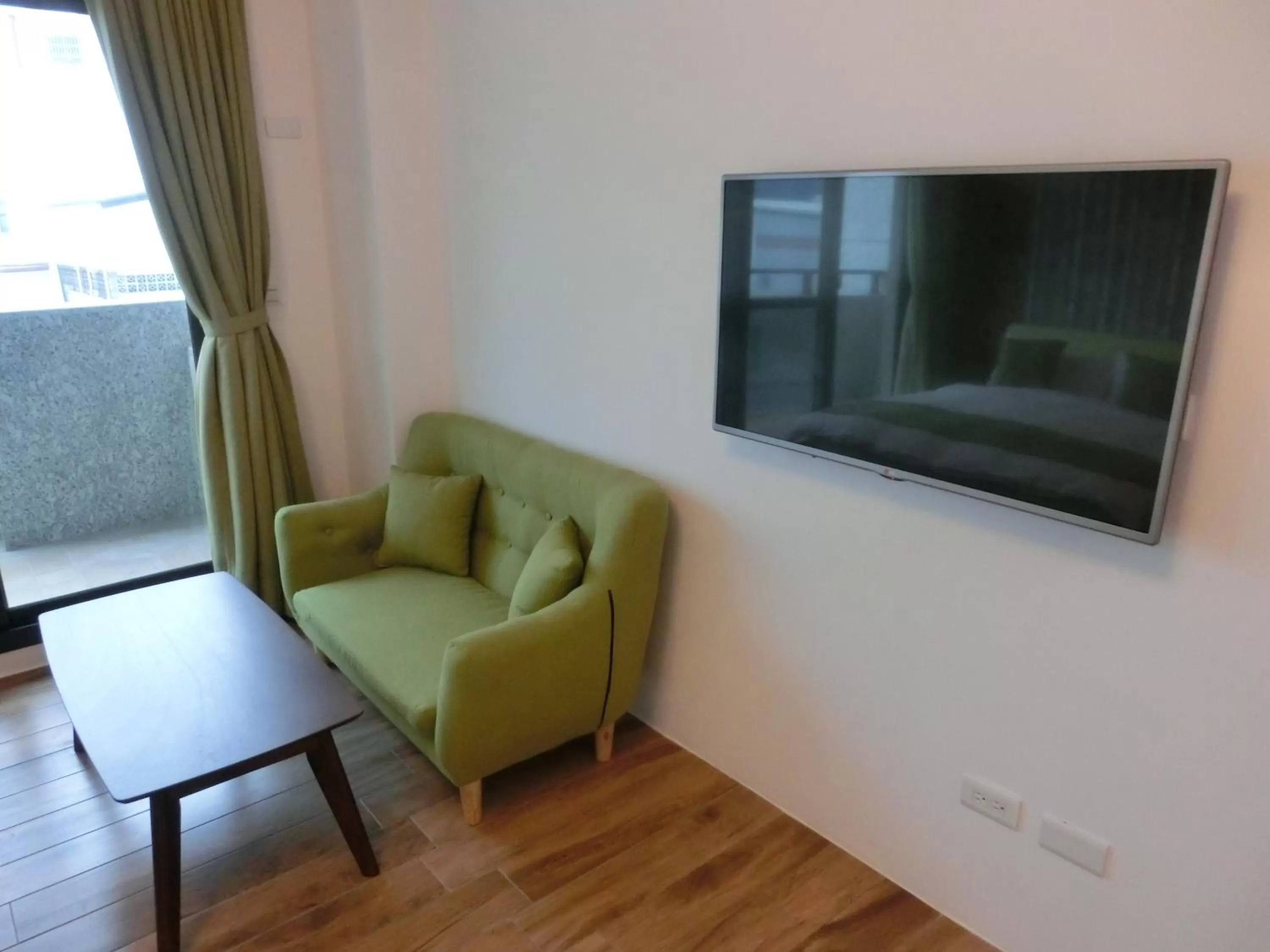 Seating area, TV/Entertainment Center in Chiyafonchin B&B