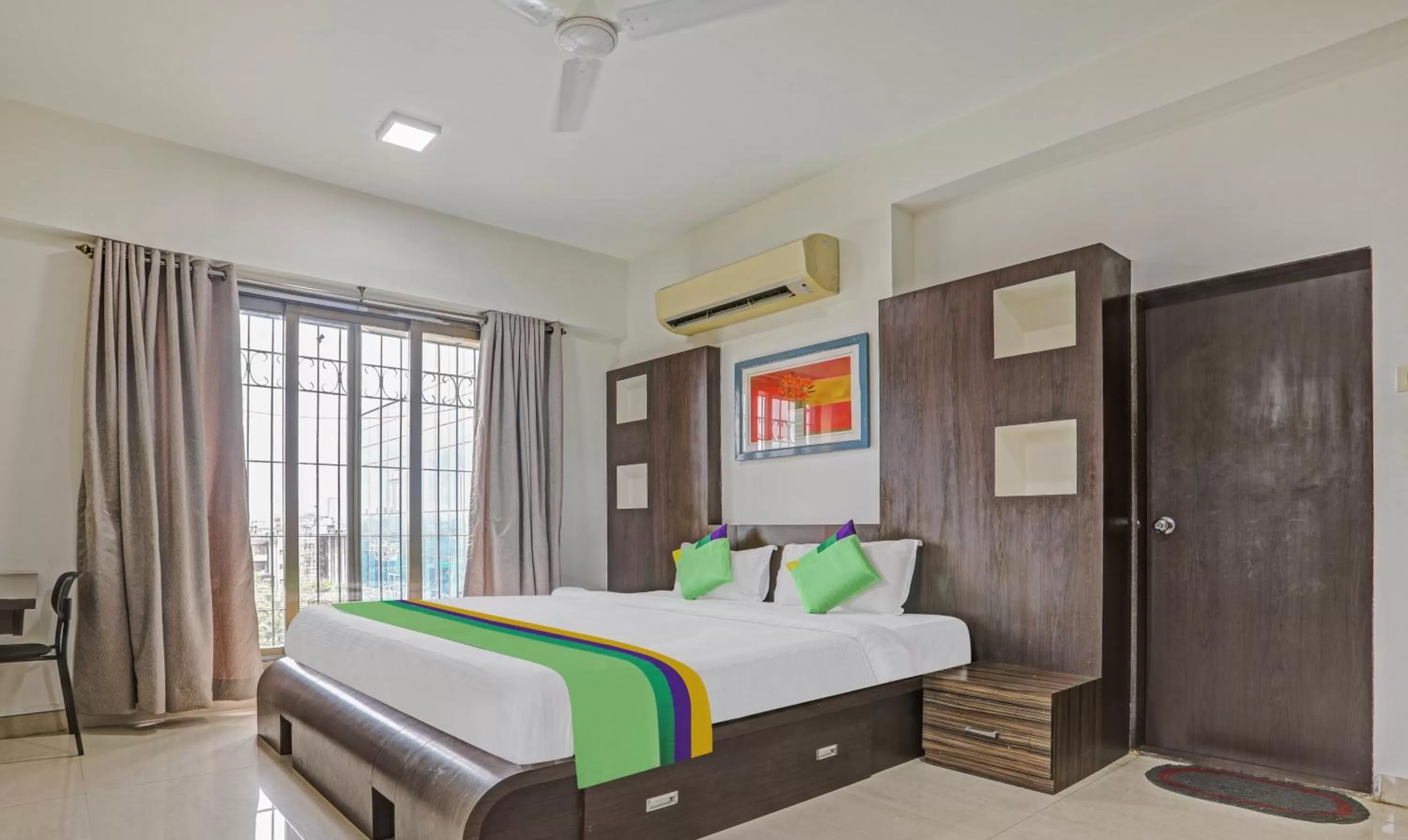 Bed in Treebo Trend Welcome Apartments