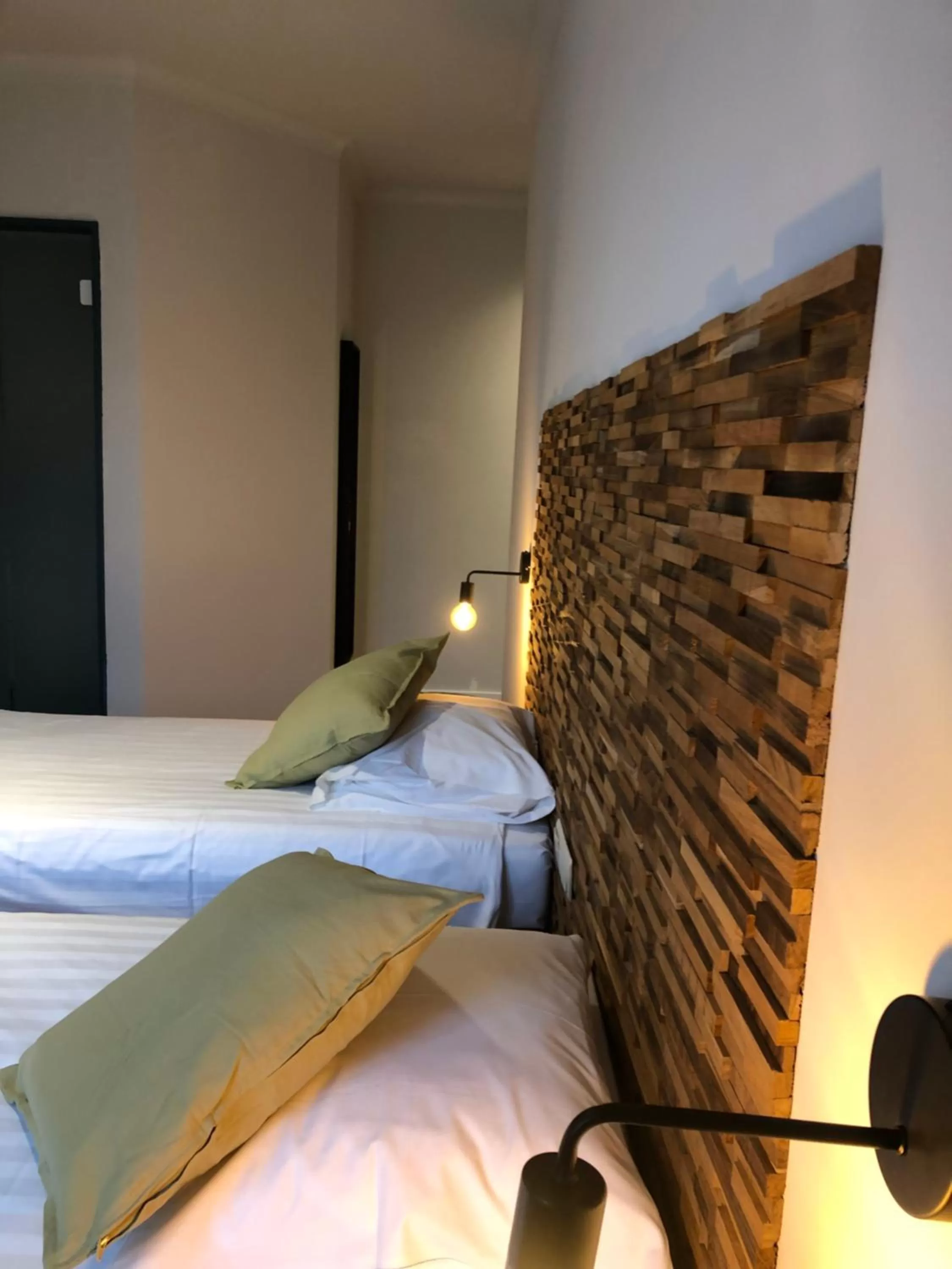 Bed in Hotel Le Cygne d'Argent