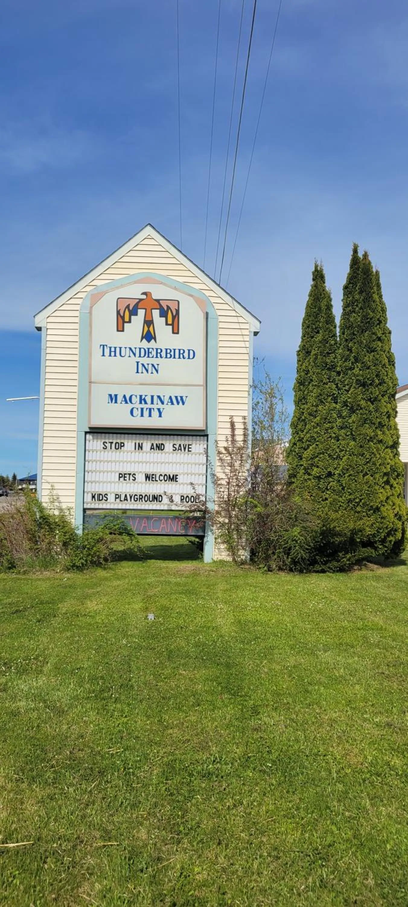 Property logo or sign in Thunderbird Inn of Mackinaw City