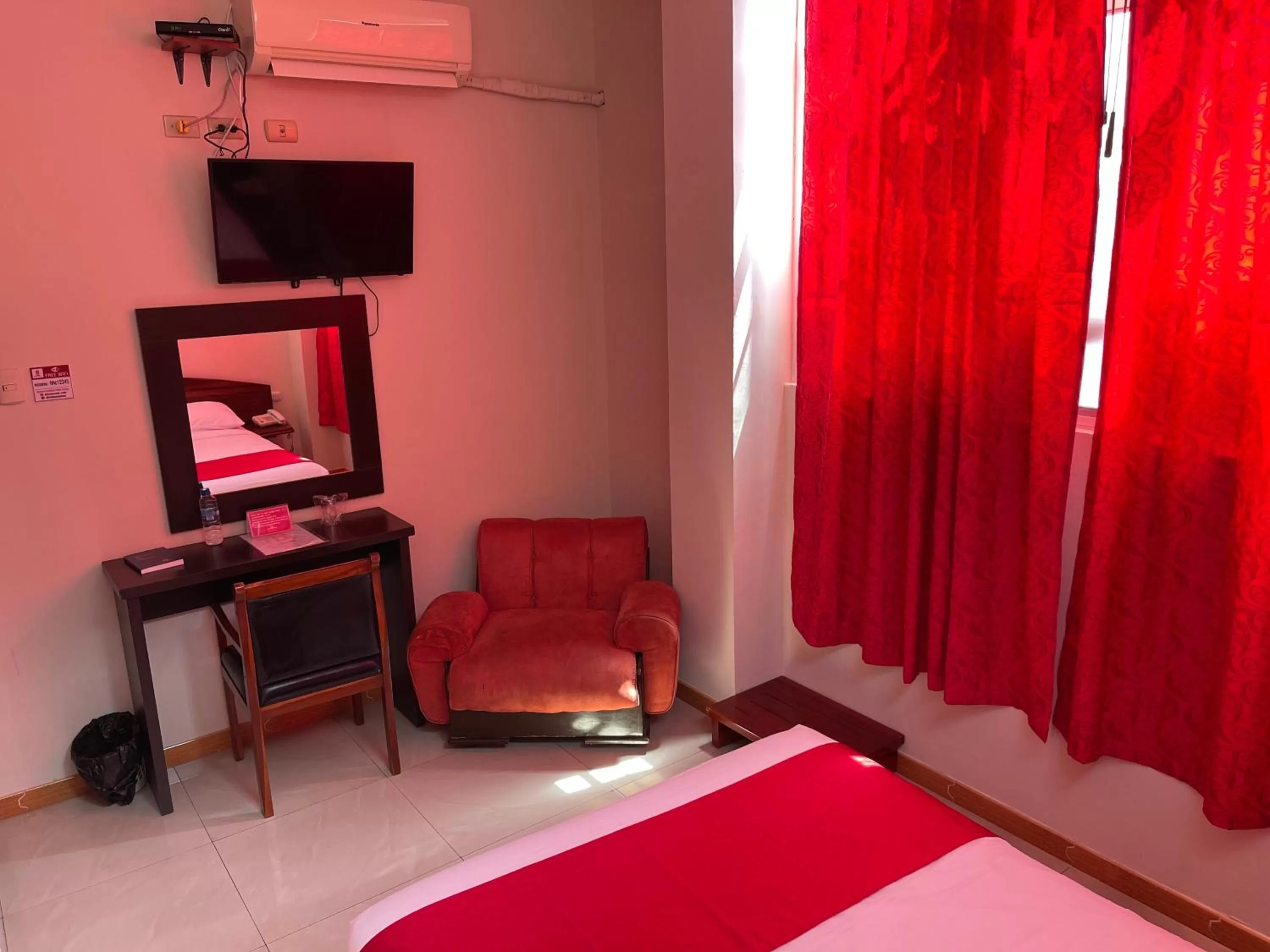 Bed, TV/Entertainment Center in House Center