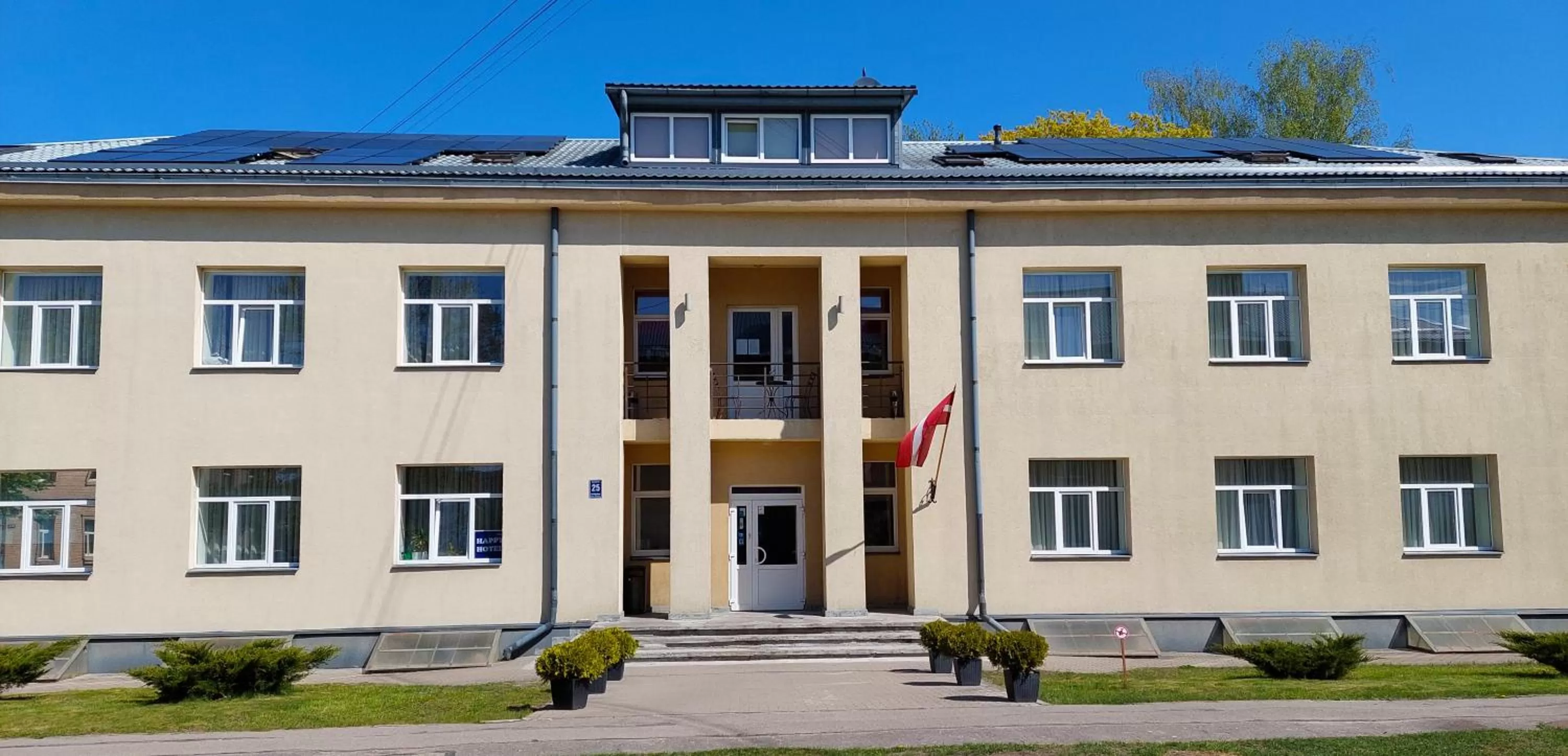 Property building in Happy Hotel