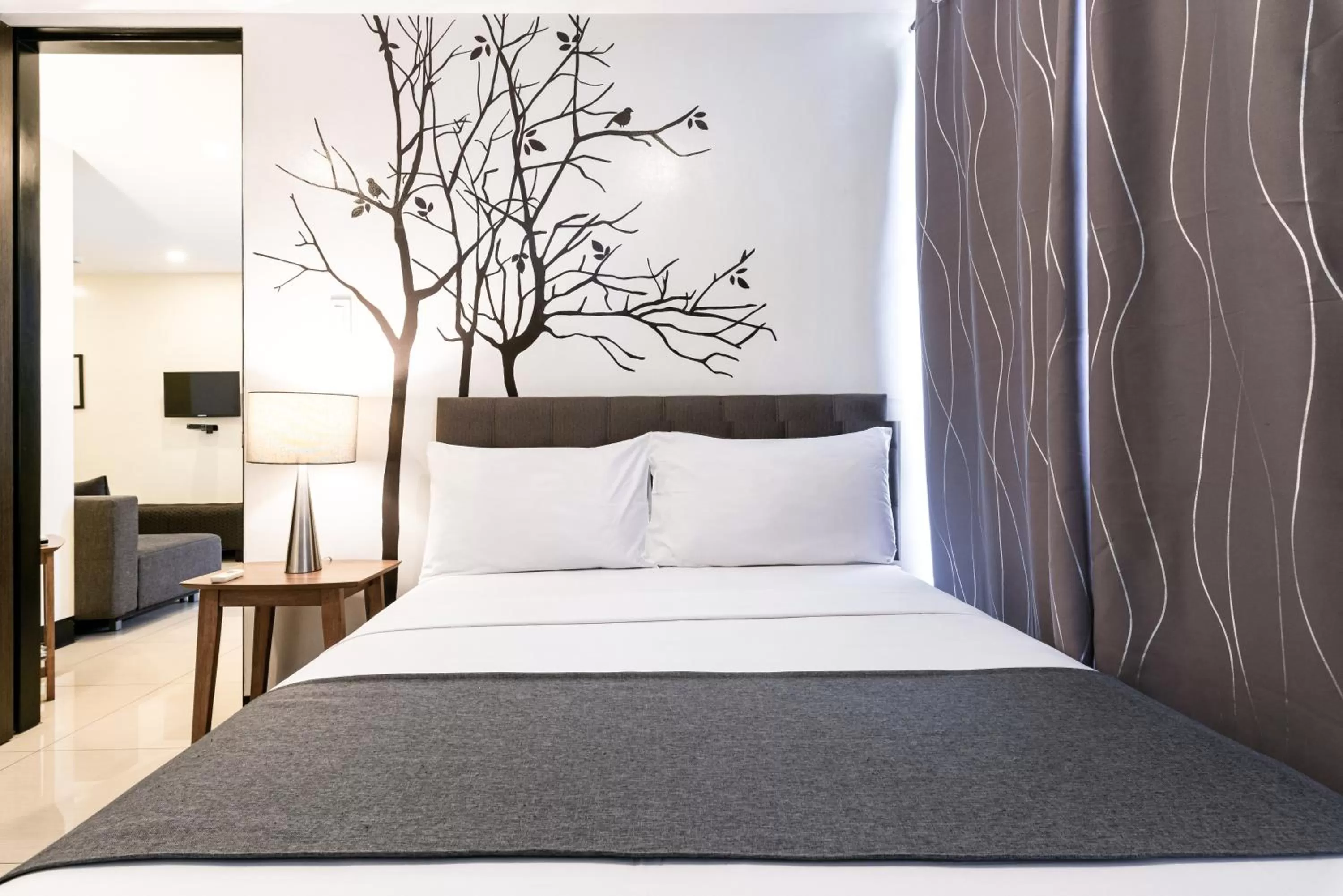 Bedroom, Bed in Artemis Place Makati Hotel