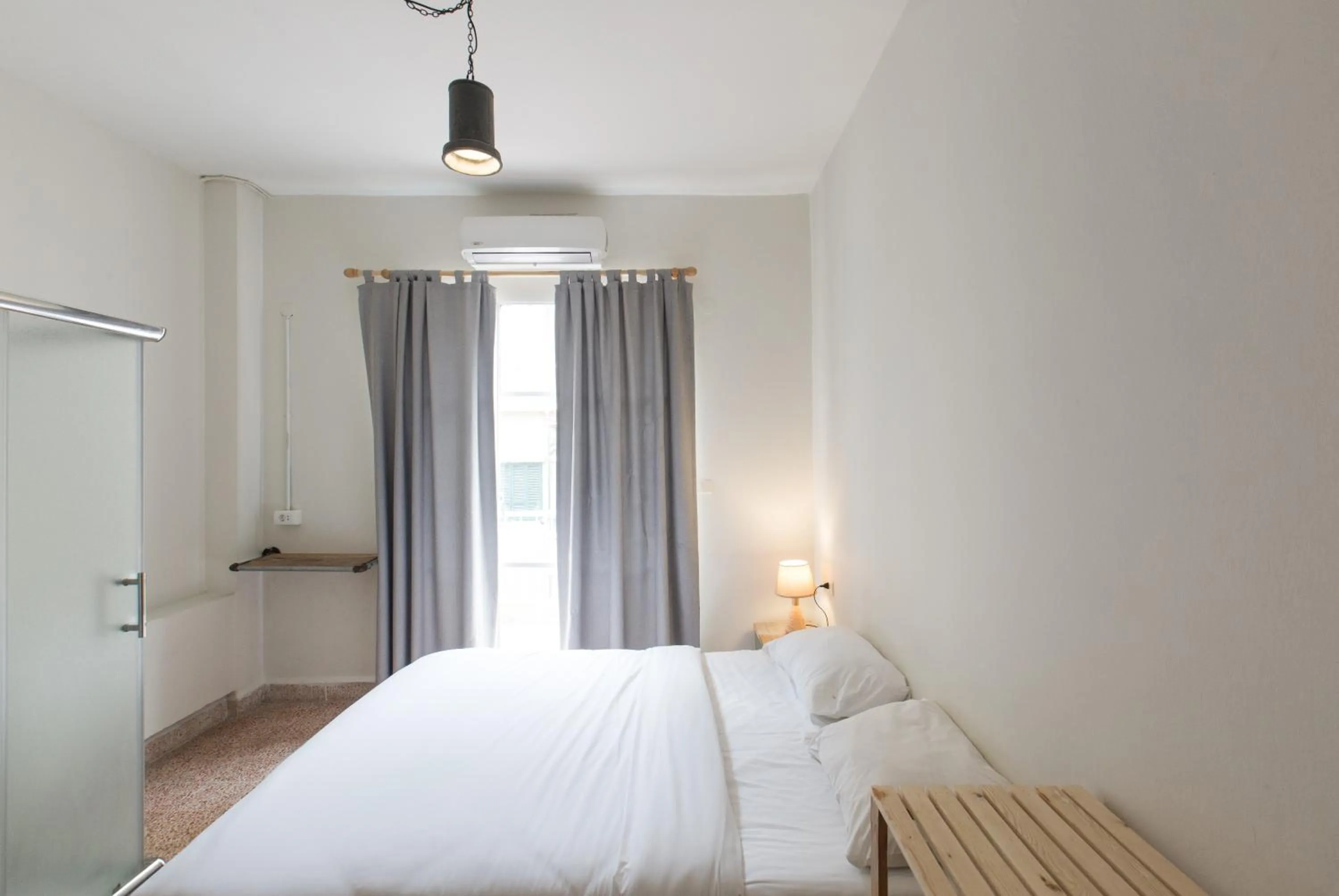 Bed in The Grand Meshmosh Hotel