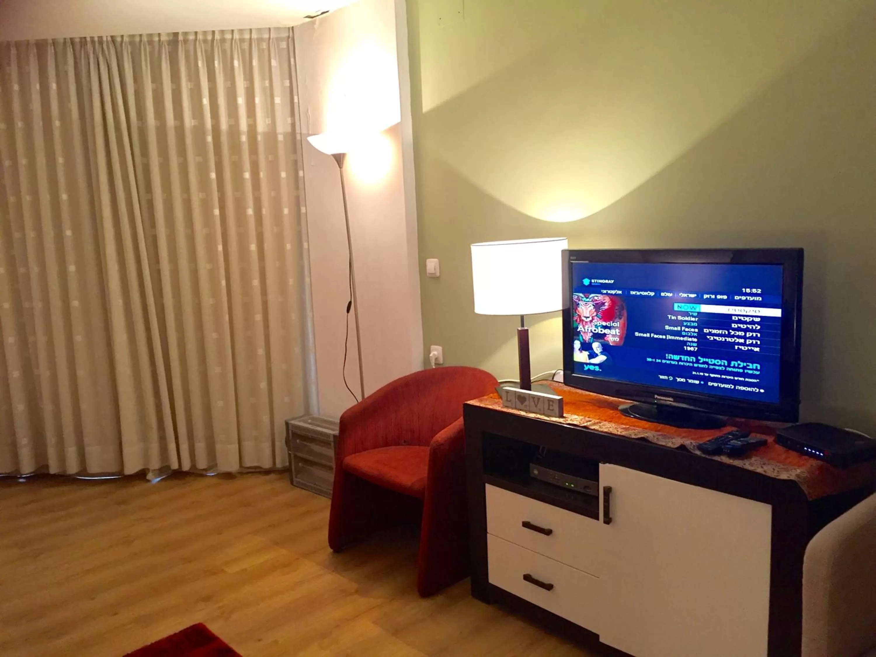 Bedroom, TV/Entertainment Center in Raphael Apartments