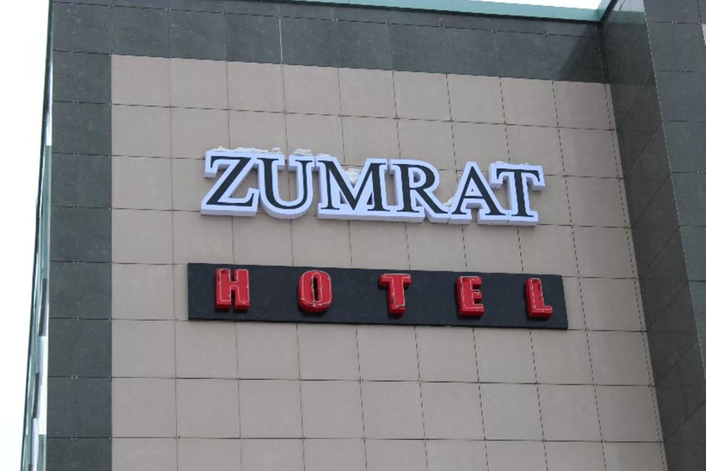 Property logo or sign in Hotel Zumrat