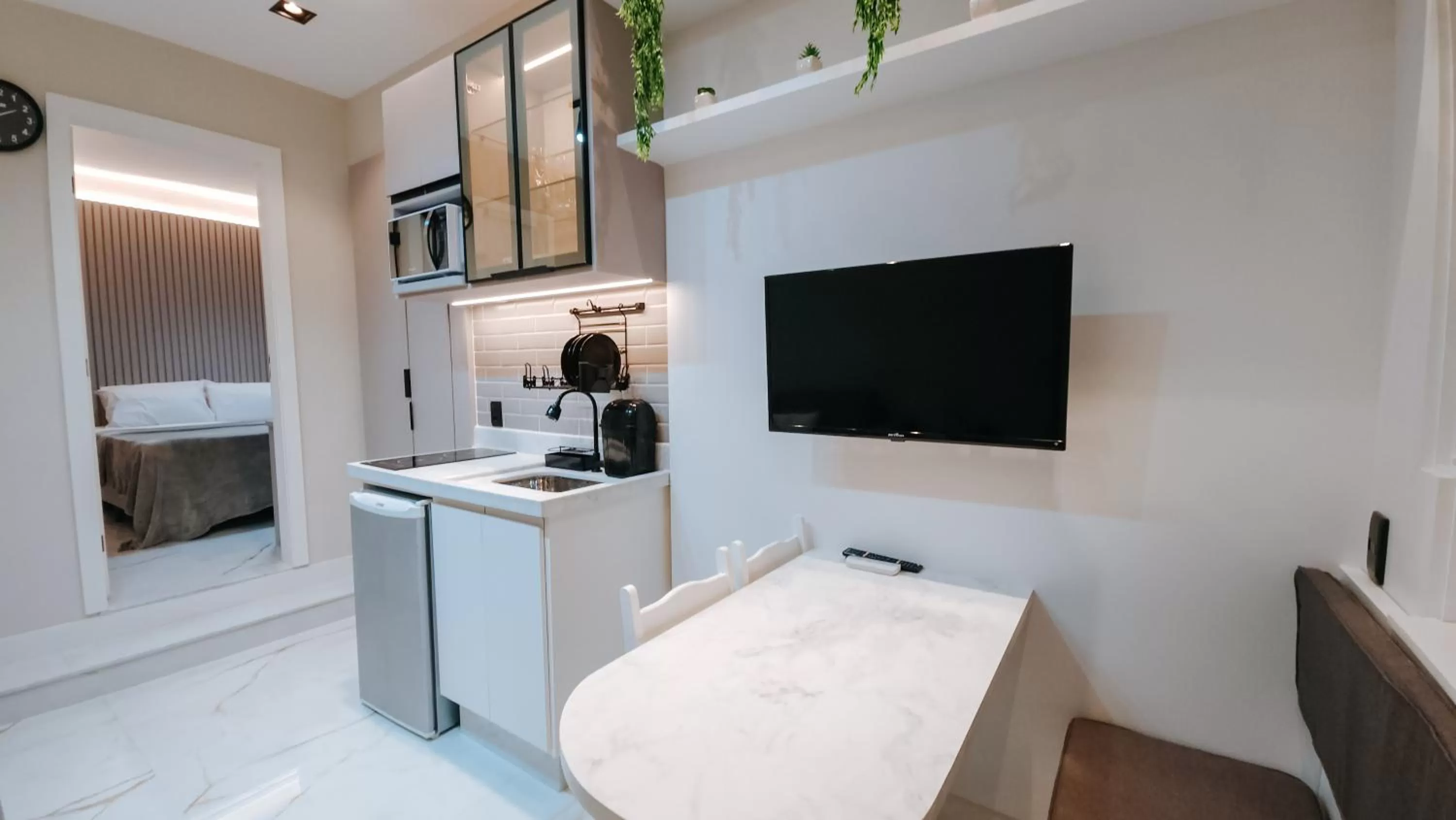 Seating area, Bed in Suítes Água Marinha