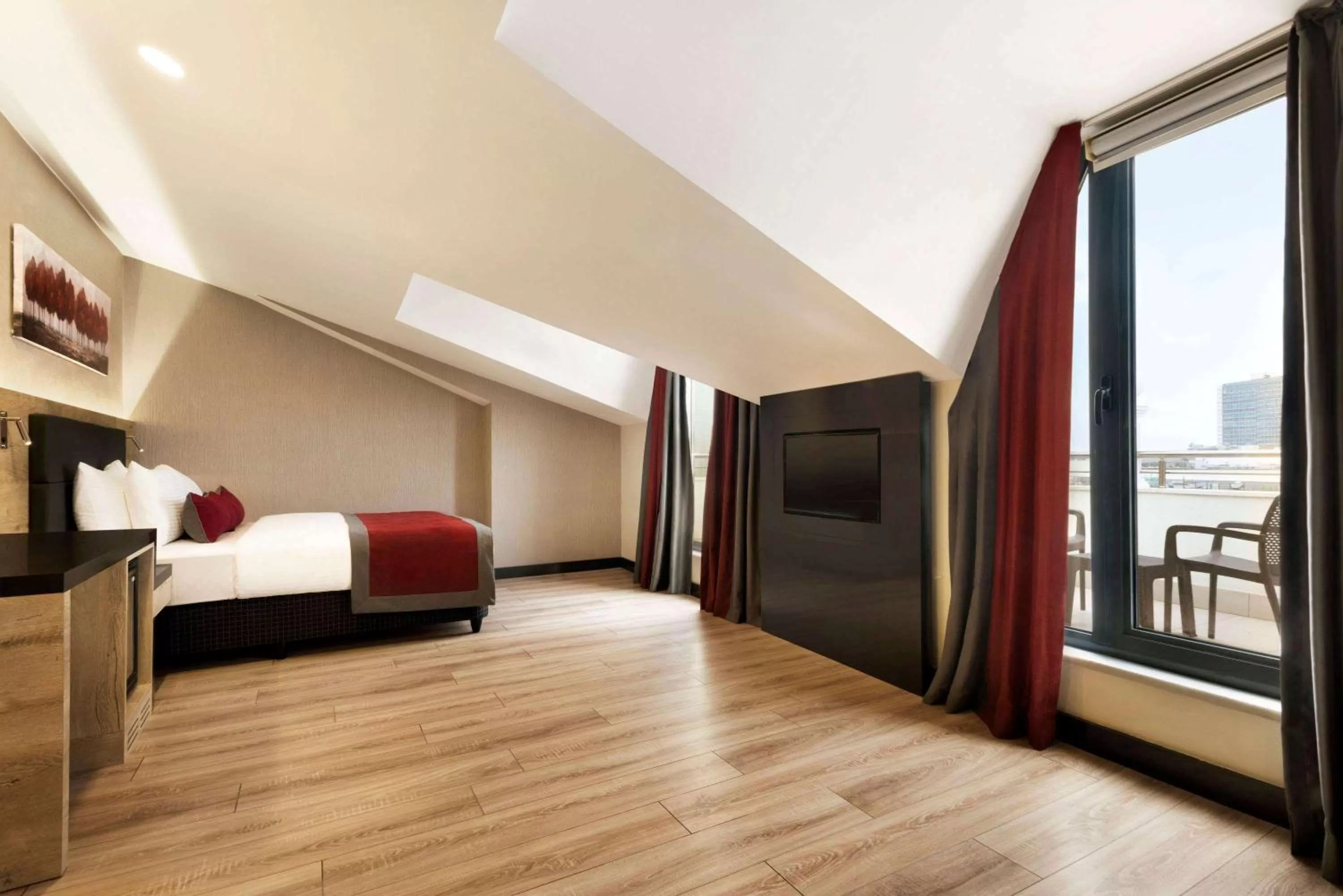 Photo of the whole room, Bed in Ramada Encore by Wyndham Gebze