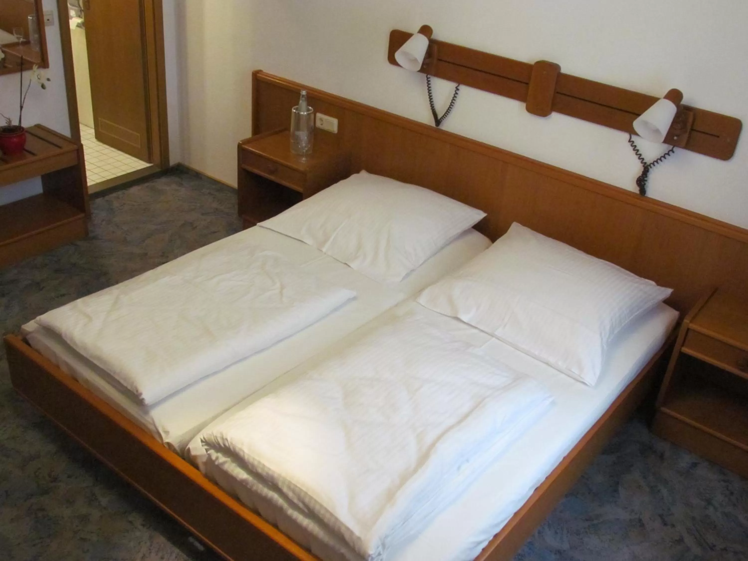 Photo of the whole room, Bed in Hotel Stadt Mainz