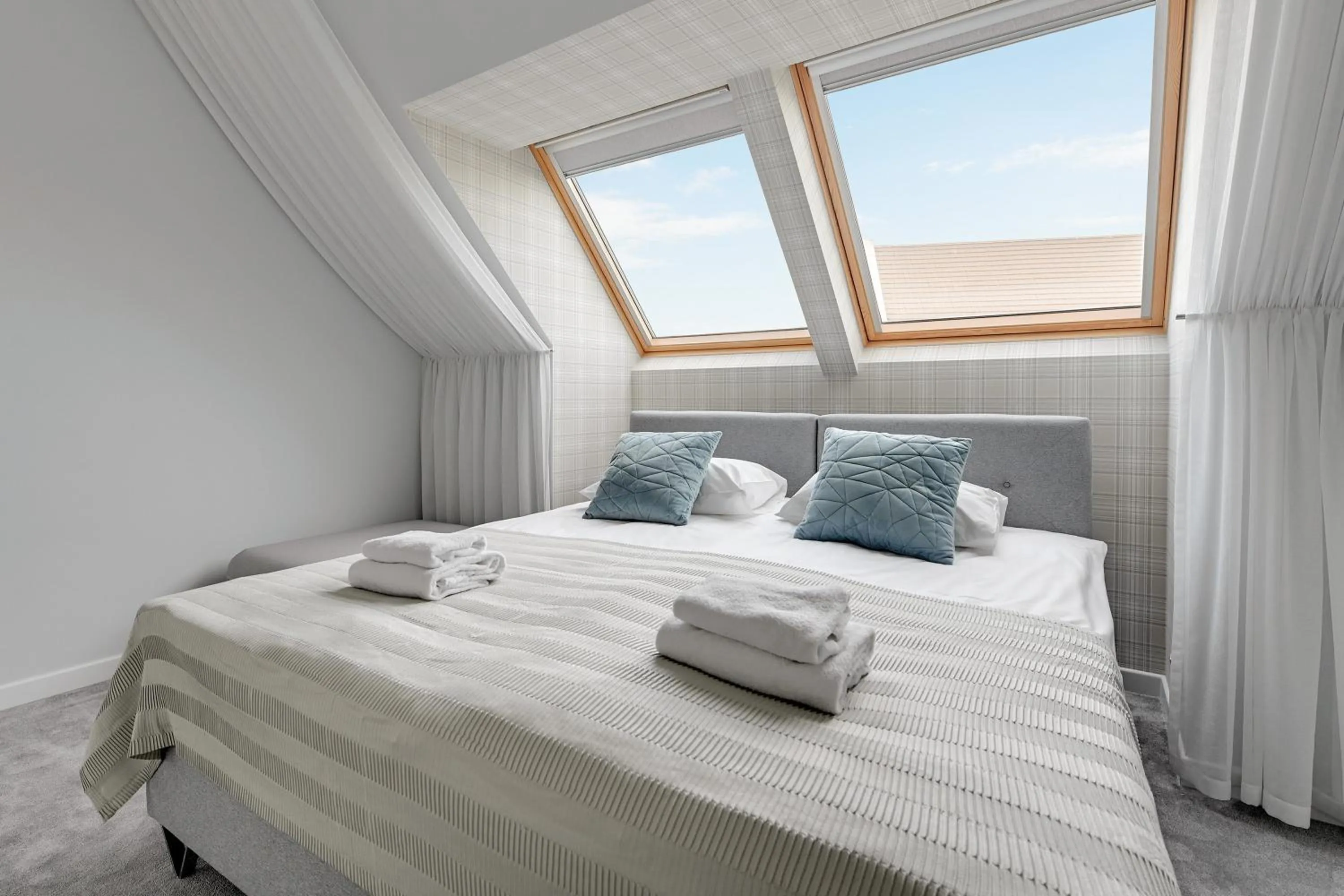 Bed in GRANO APARTMENTS Gdańsk Motława SPA & Wellness