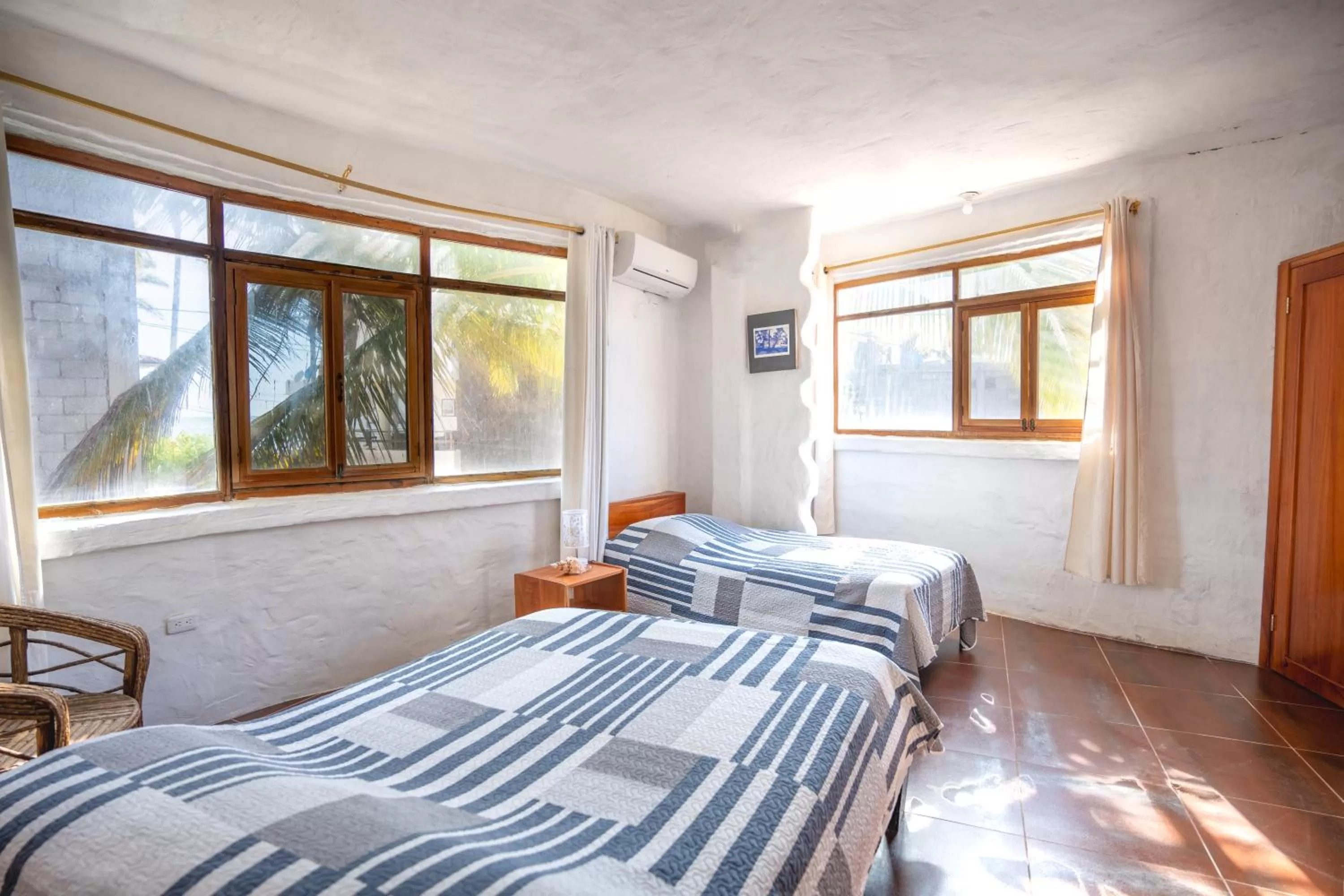 Bed in Hostal Galapagos by Bar de Beto