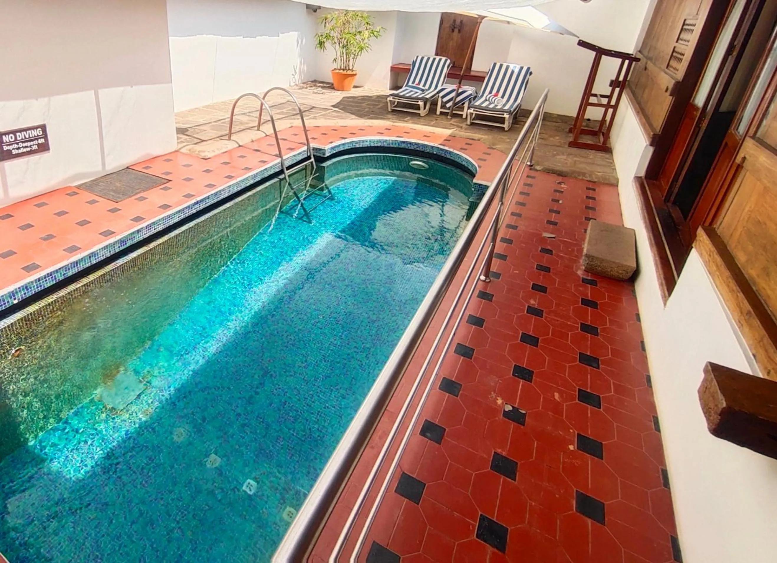 Swimming pool in The Travancore Heritage Beach Resort