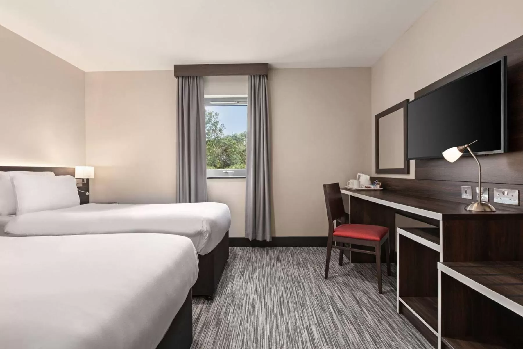 Photo of the whole room, Bed in Ramada by Wyndham Cobham