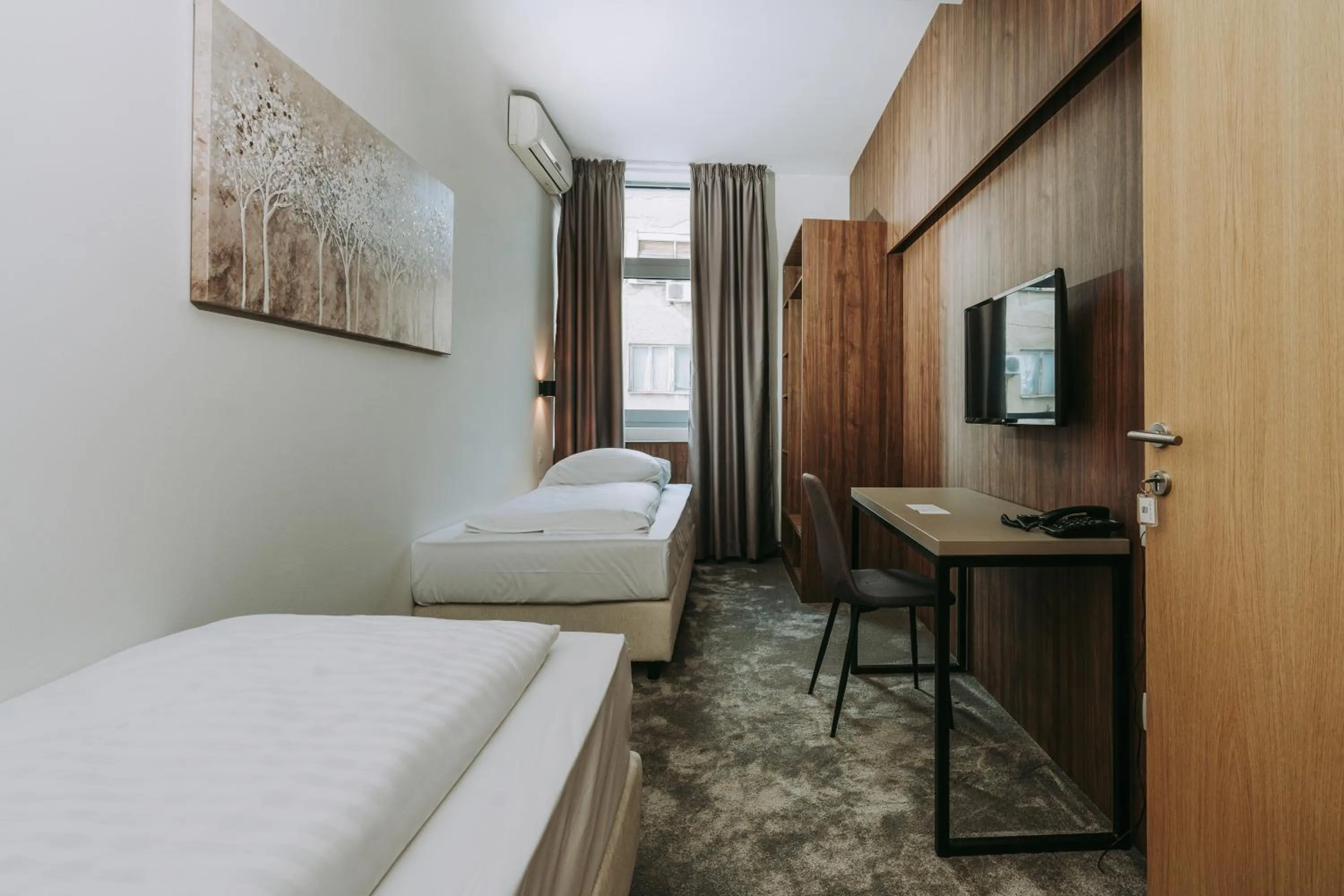 Bed in Hotel Sliško