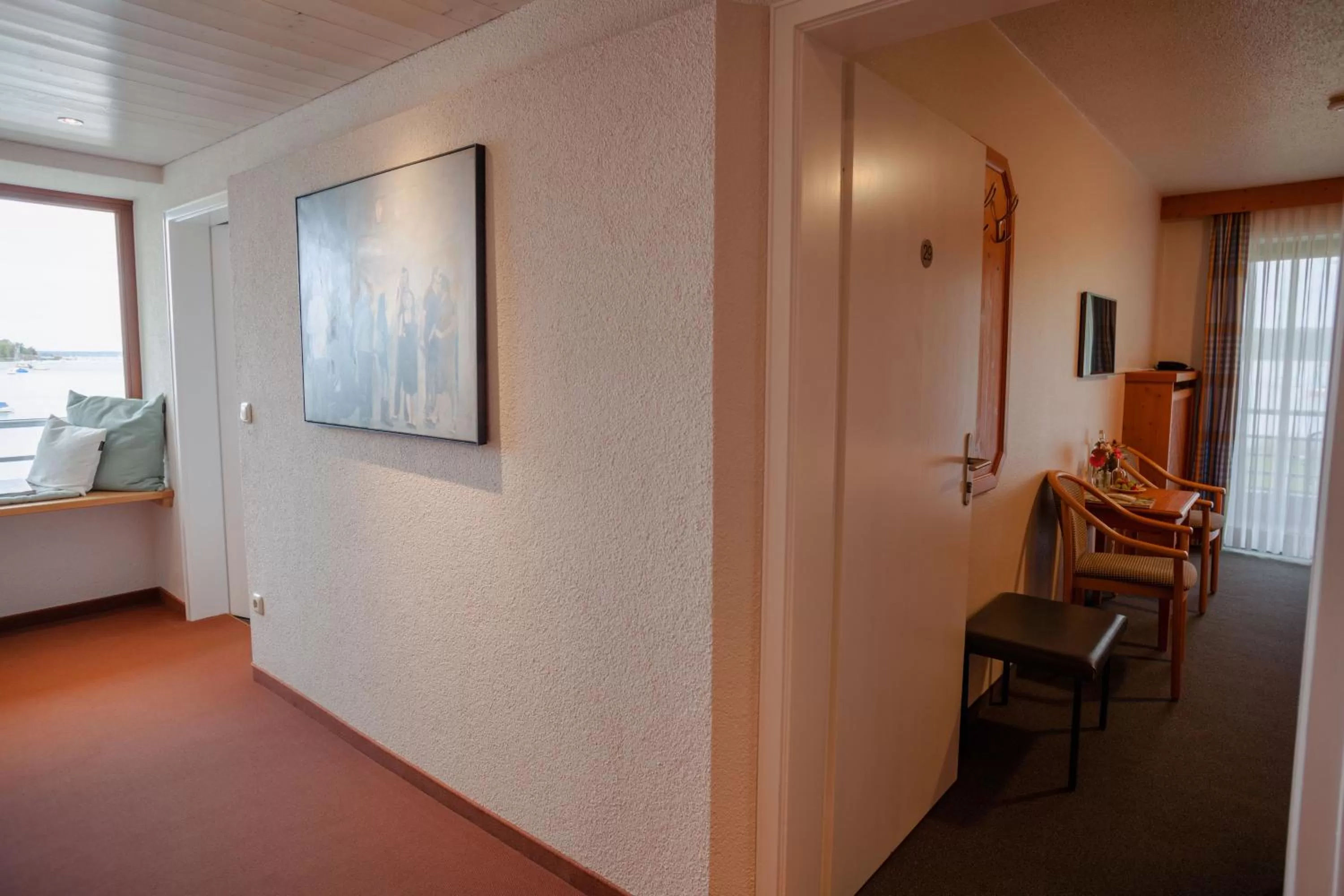 Photo of the whole room, TV/Entertainment Center in Strandhotel SüdSee Diessen am Ammersee