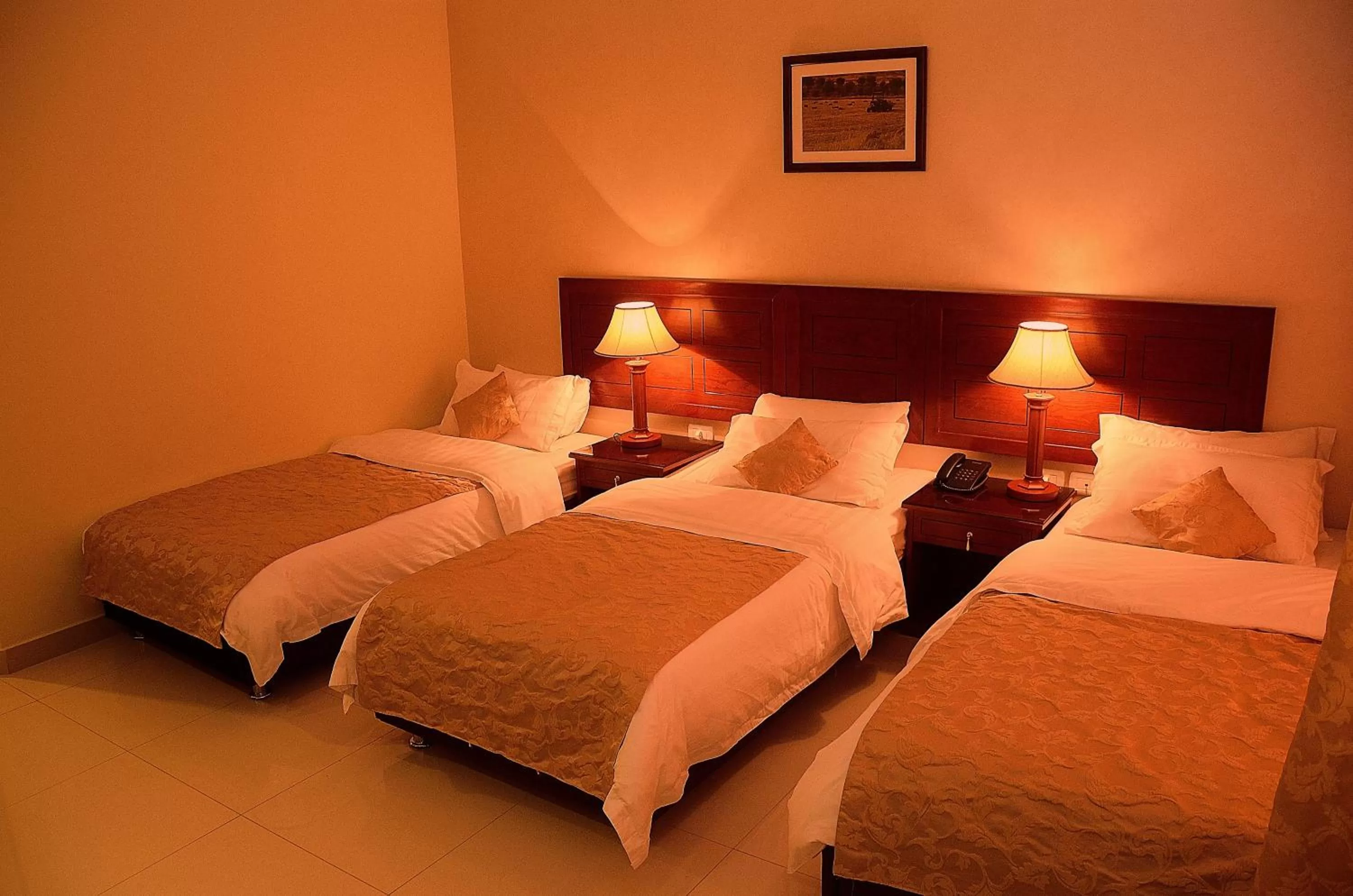 Bed in Mosaic City Hotel