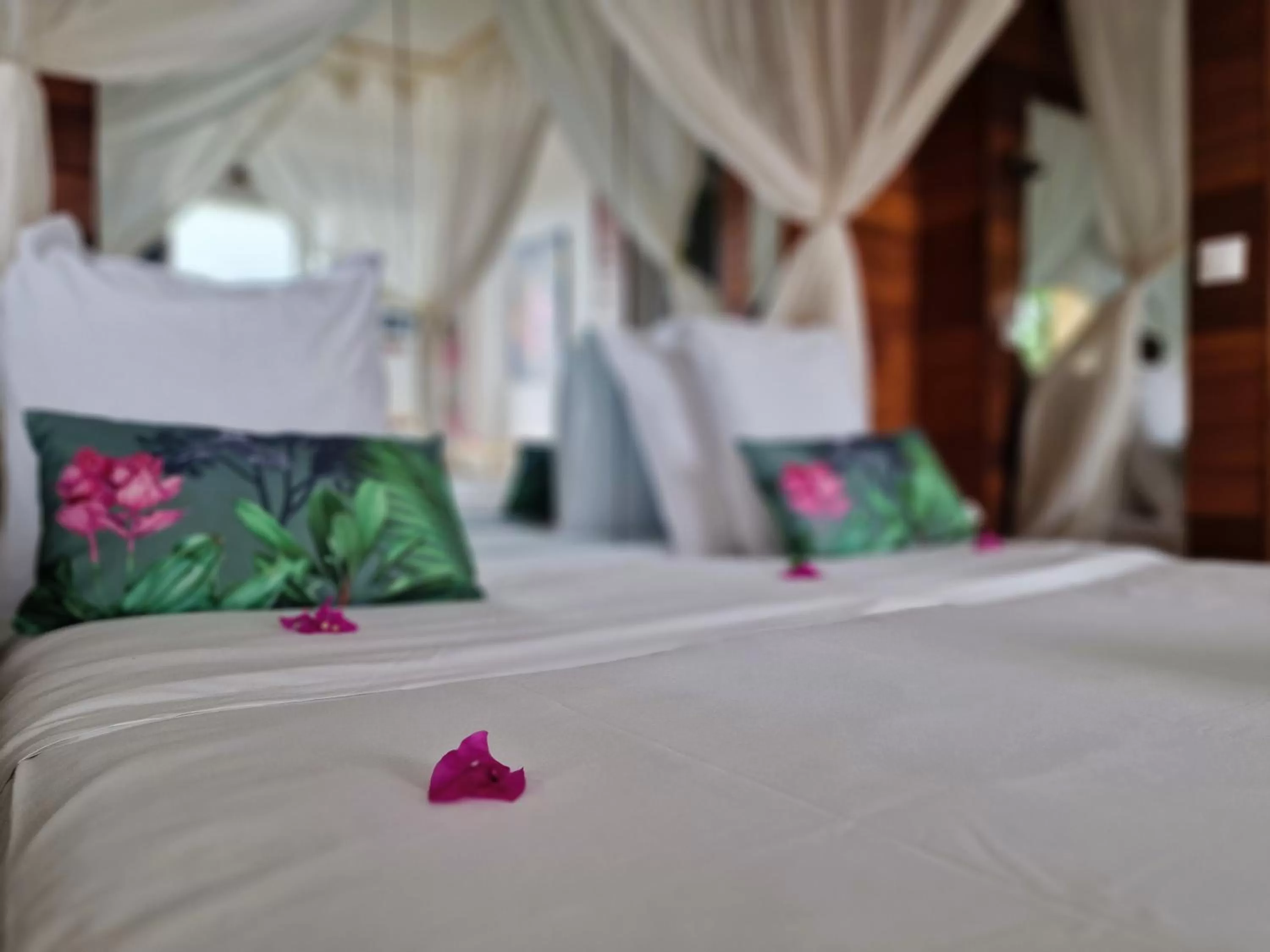 Bed in Hotel Le Manguier