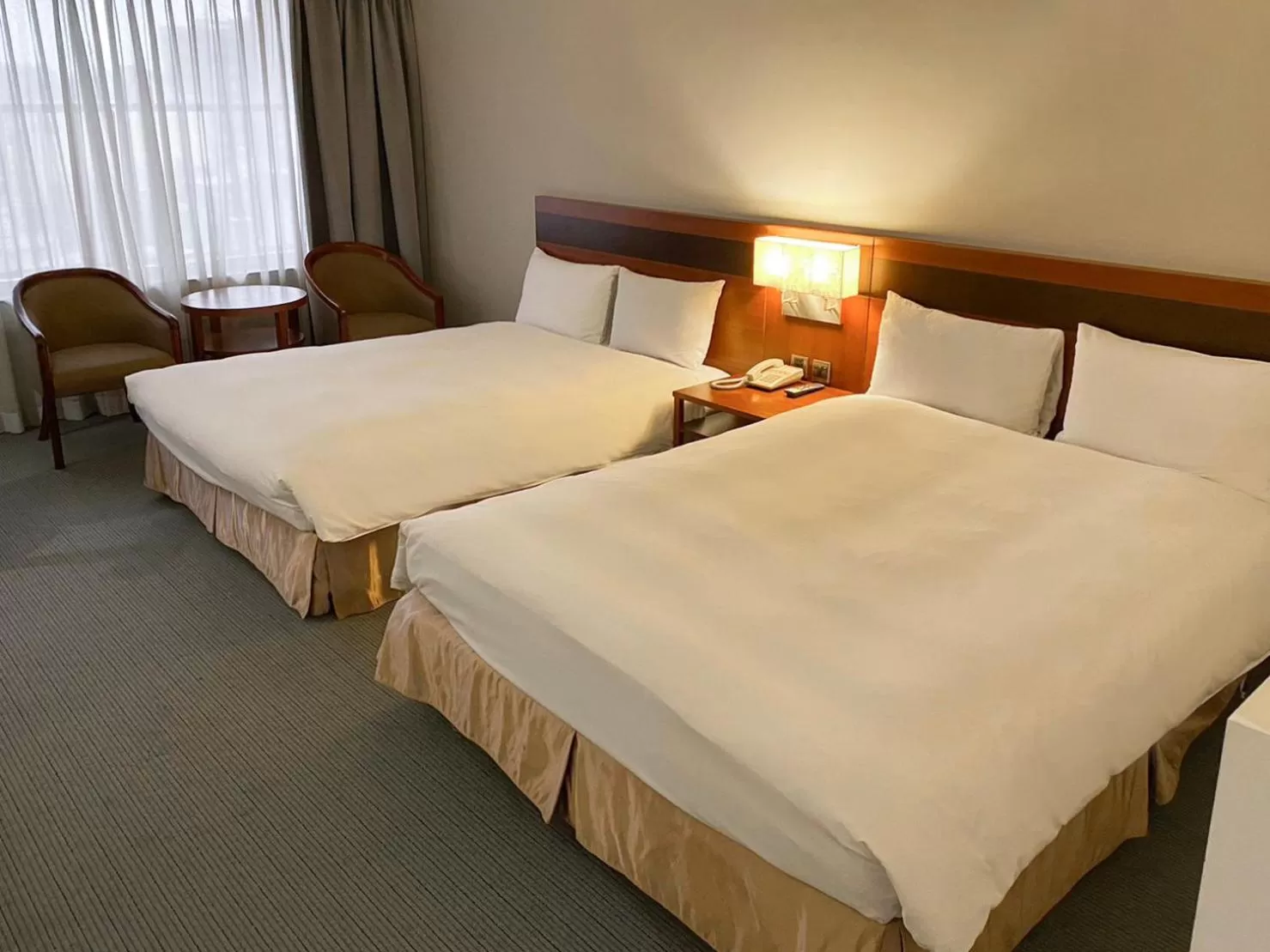 Photo of the whole room, Bed in Guide Hotel Hsinchu Zhongyang
