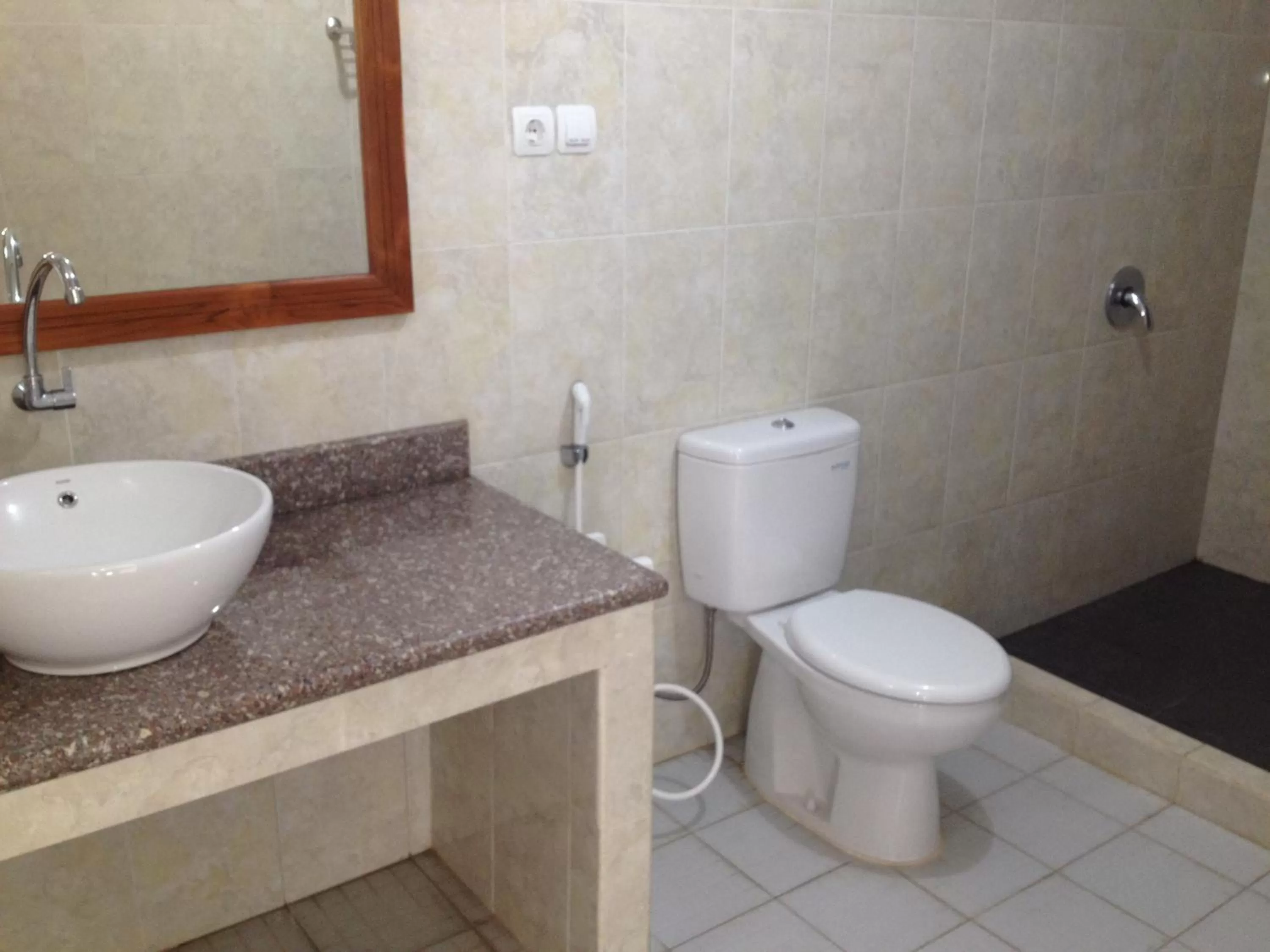 Bathroom in Astina Hotel