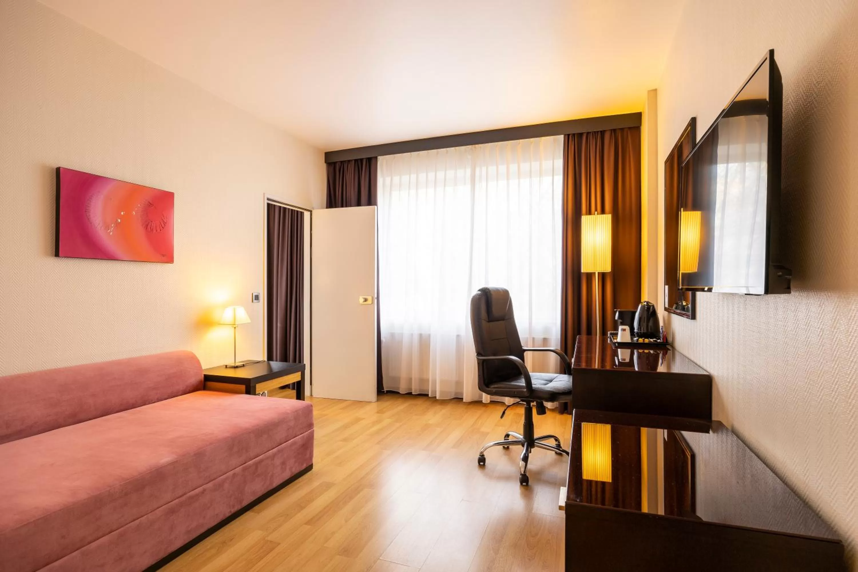 Bedroom, Seating Area in The President Brussels Hotel