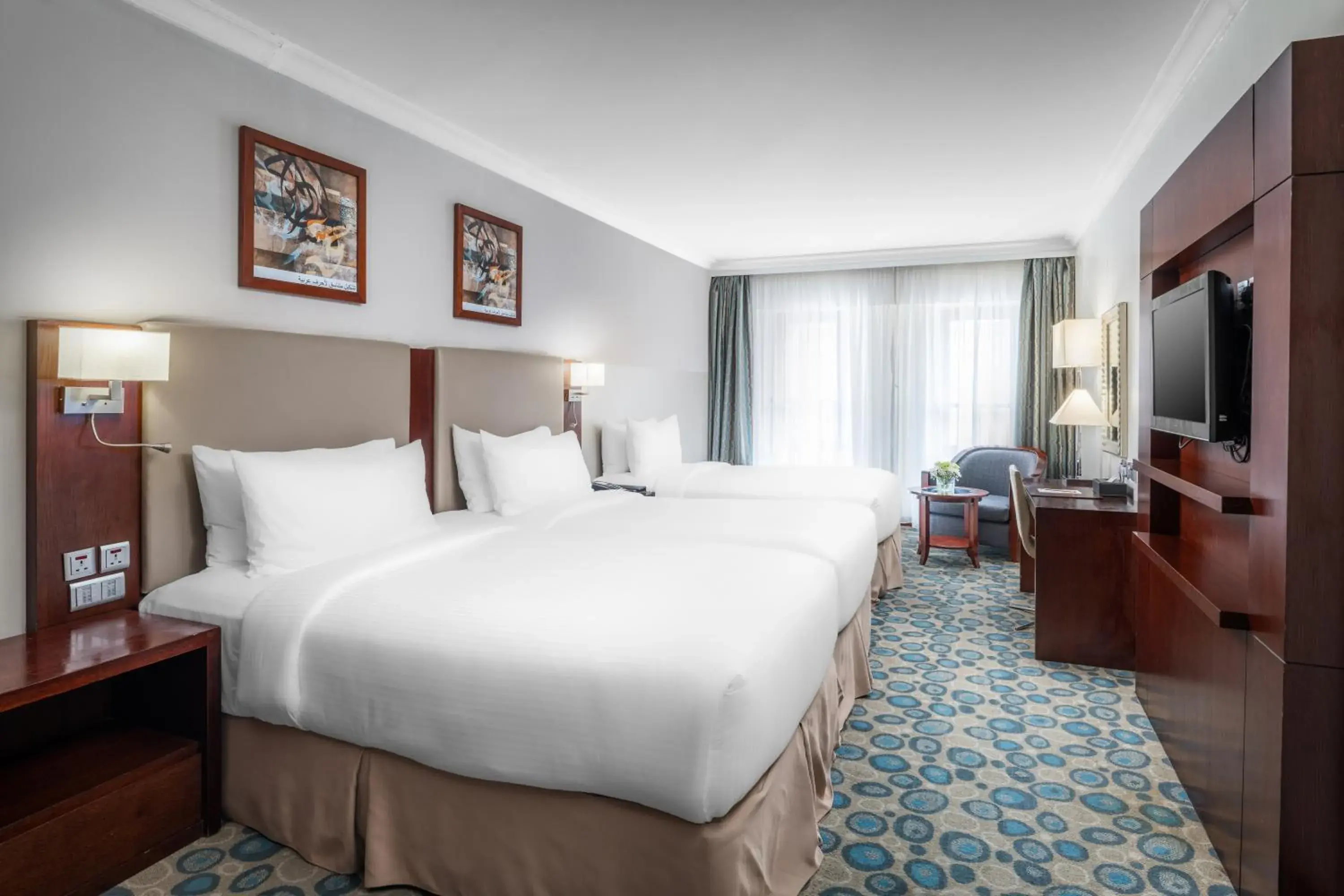 Classic Room Triple bed, City View in Millennium Al Aqeeq Hotel Classic Room Triple bed, City View in Millennium Al Aqeeq Hotel