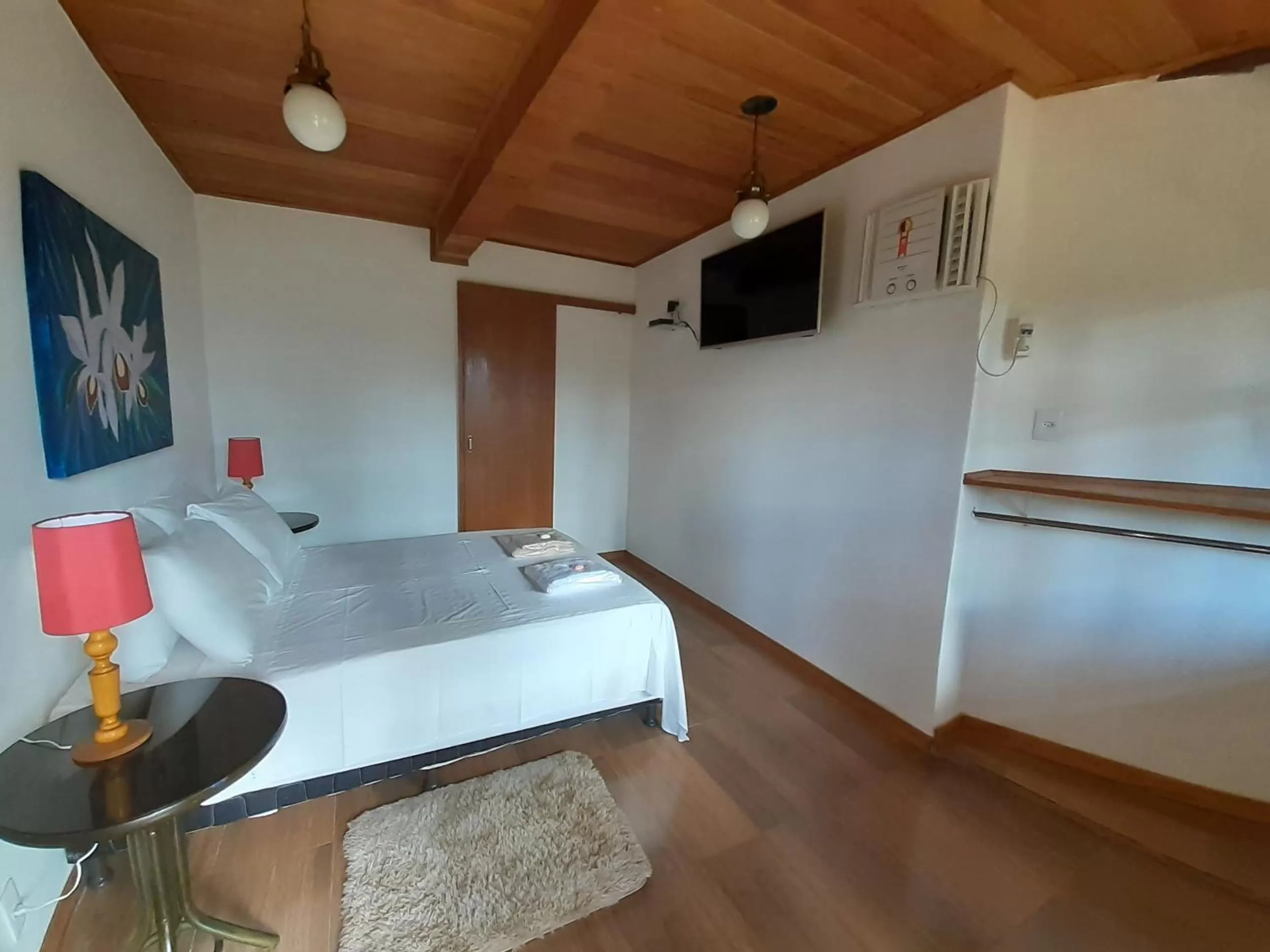 Bed in Pousada R.N.C. Nosso Paraíso