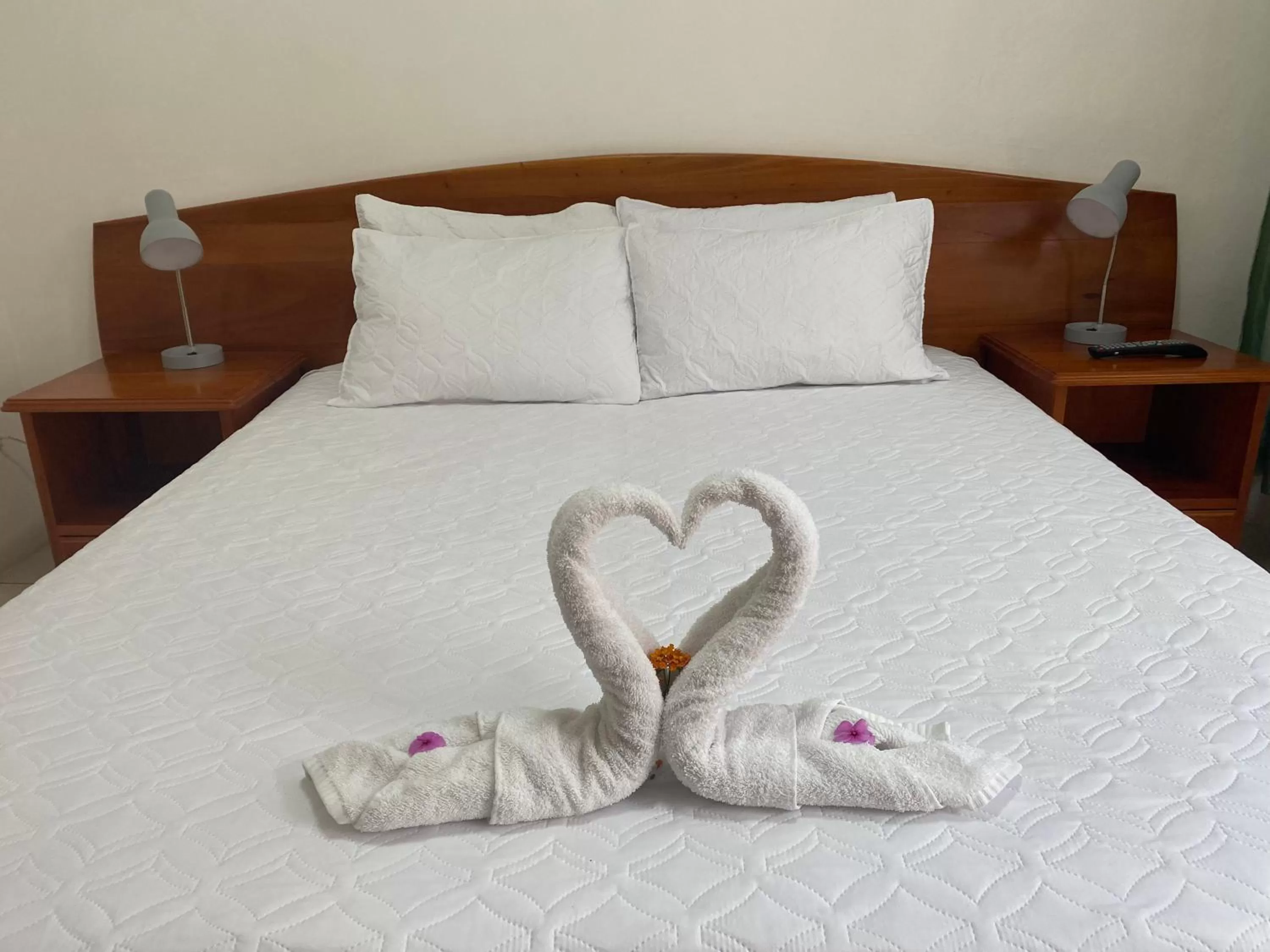 Bed in La Peregrina Galapagos B&B