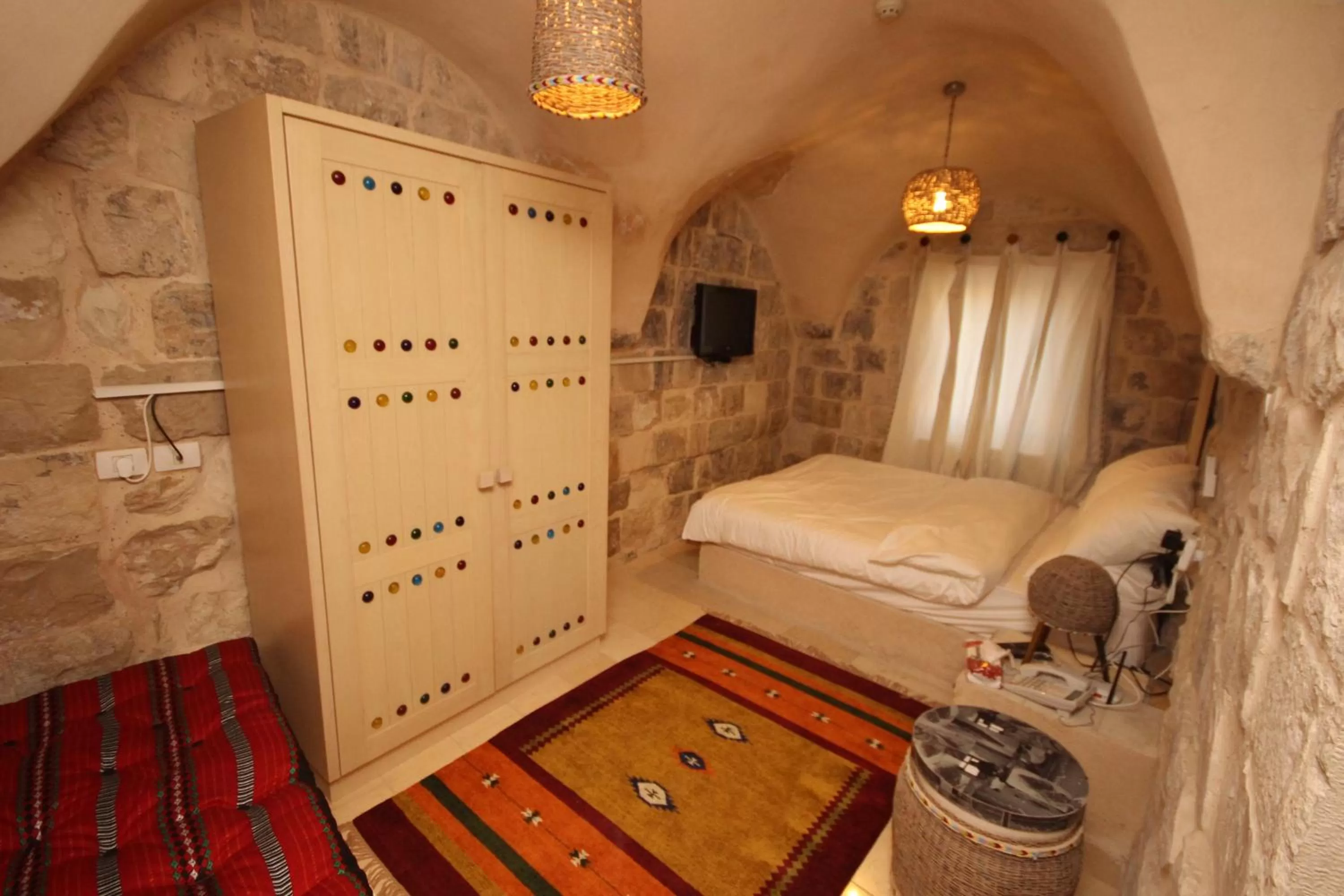 Bed in Khan Alwakala Hotel