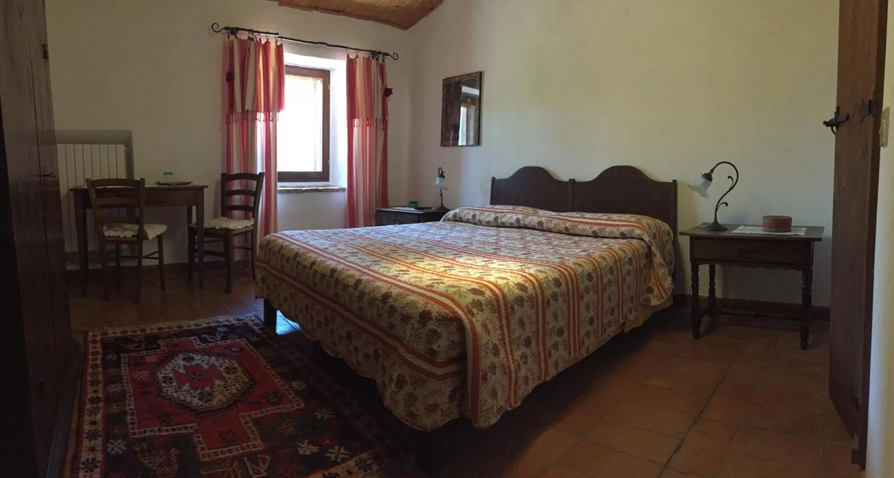 Photo of the whole room, Bed in Podere Pinzicalari