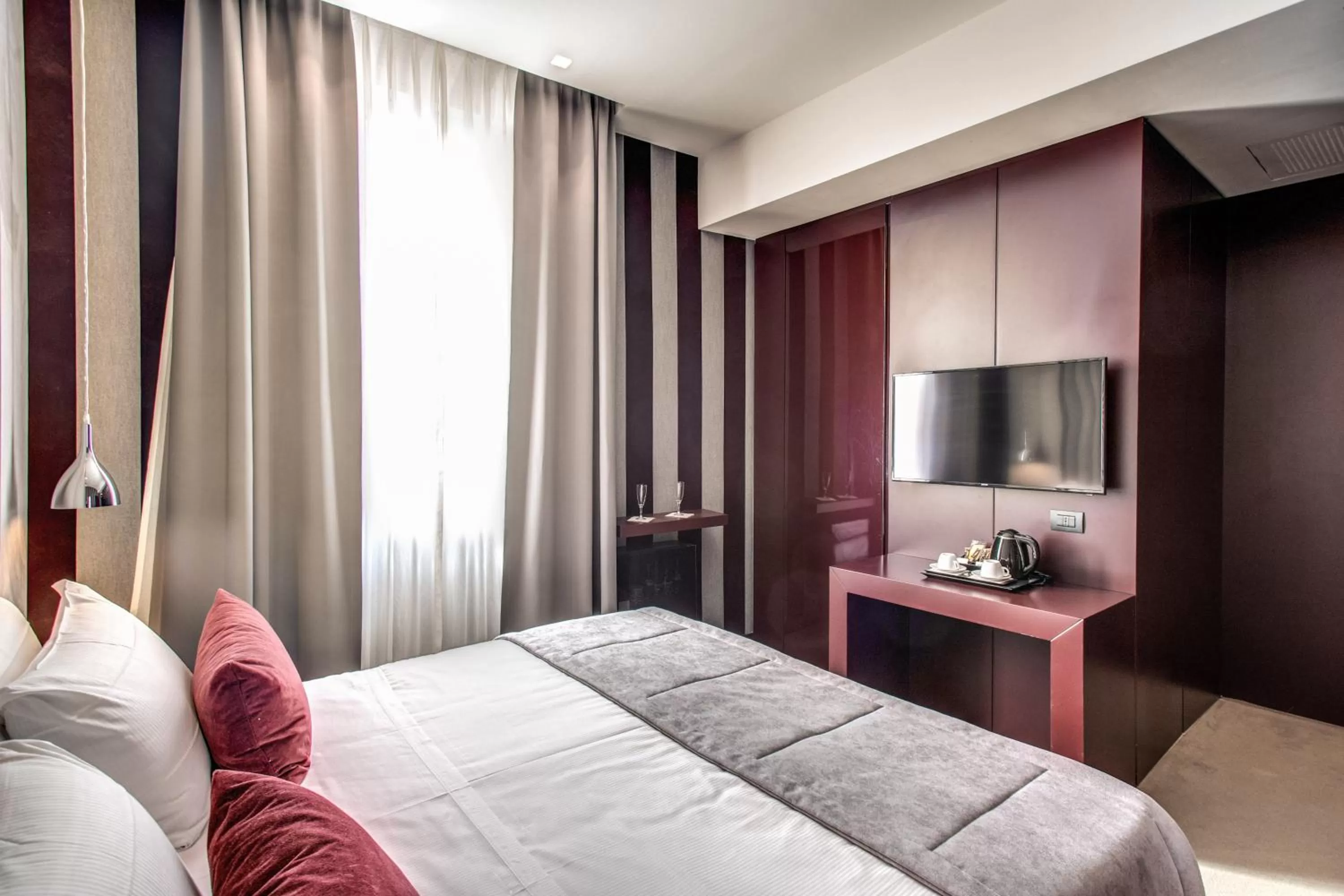 Bed in Doria Palace Boutique Hotel