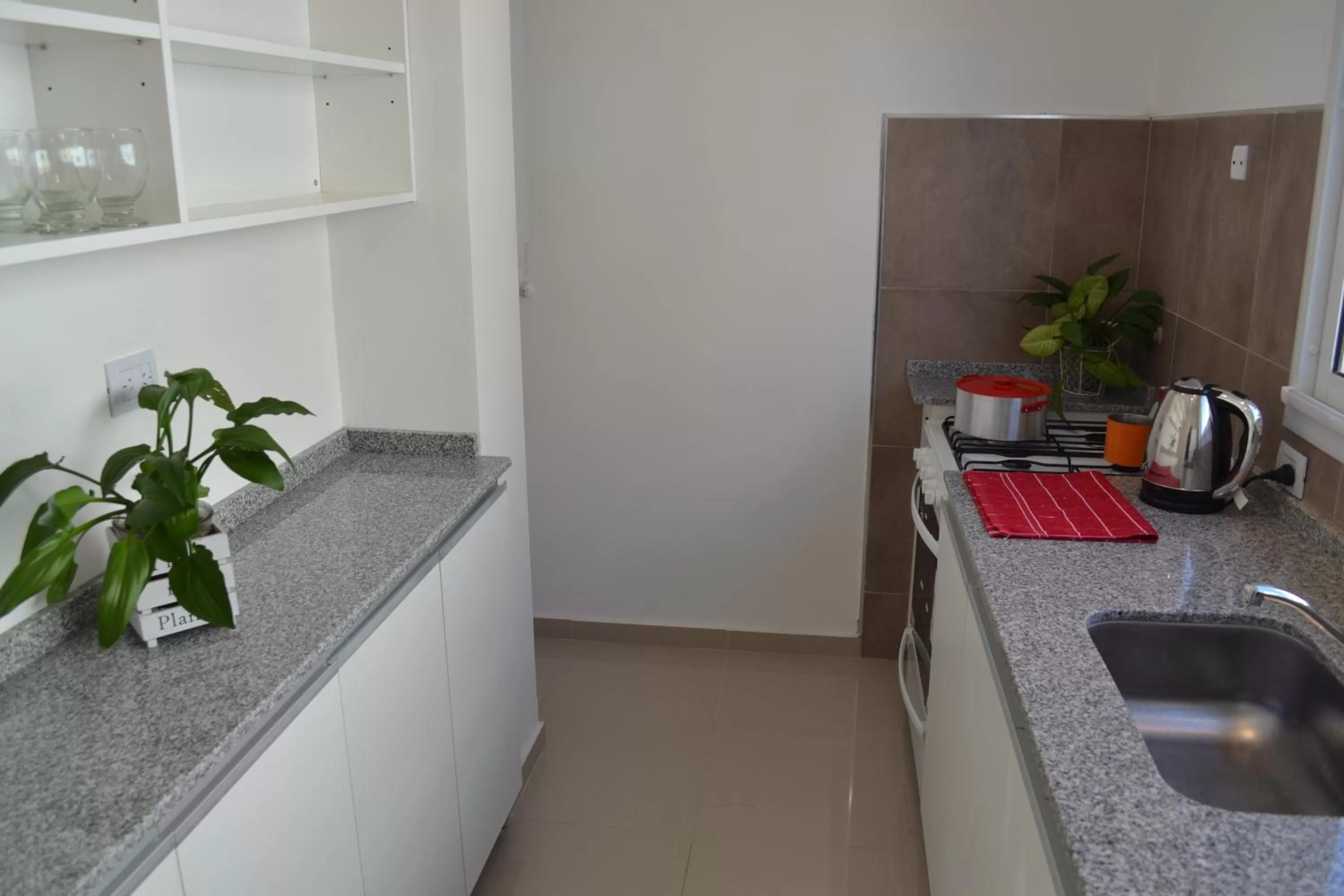 Kitchen/Kitchenette in Apart Porto del Sol by CPH