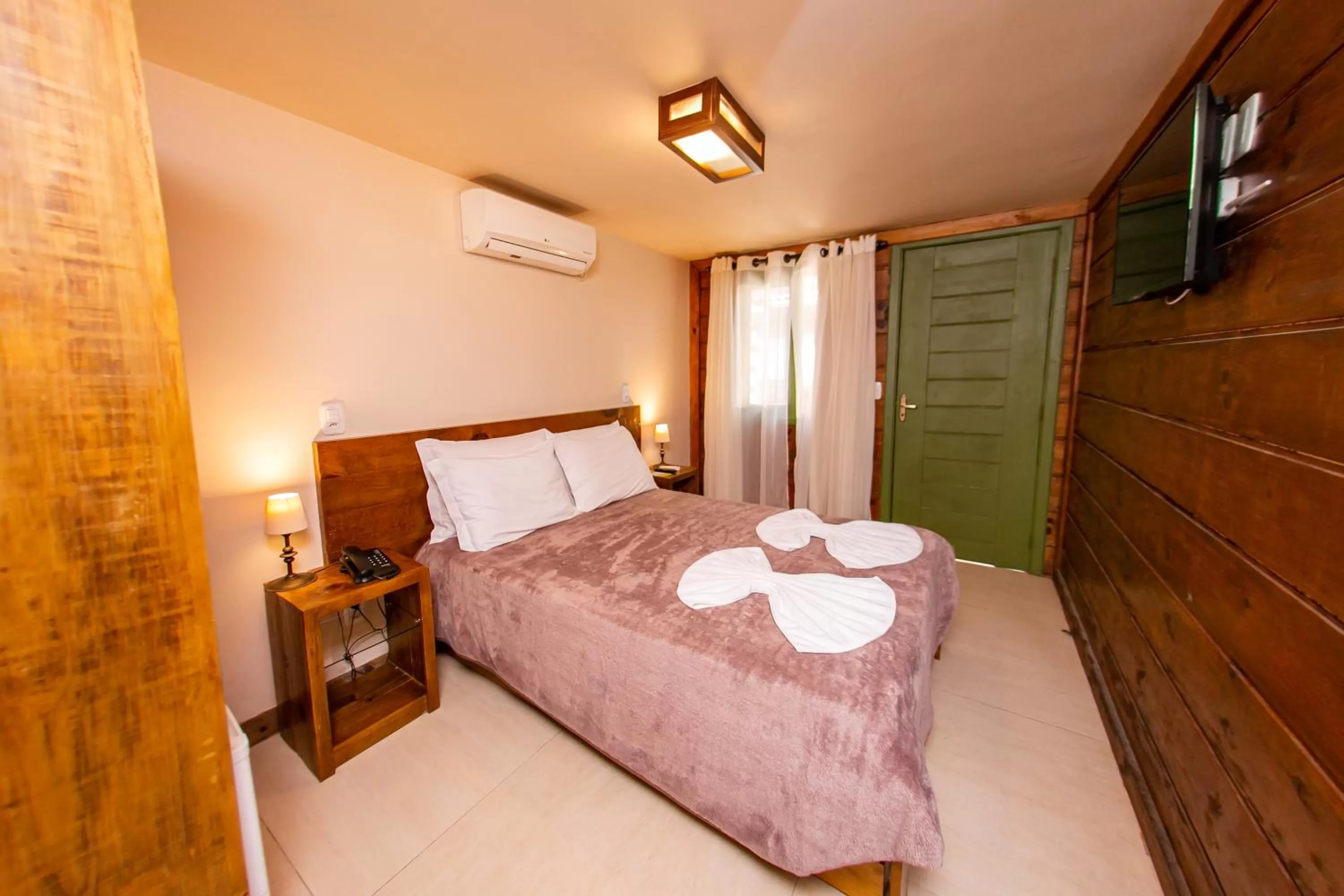 Bed in Pousada Charm Canela