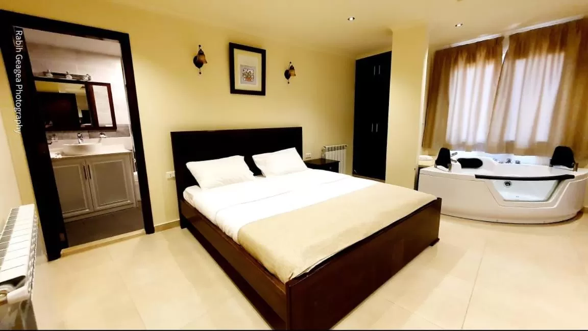 Bed in Hotel L'Aiglon