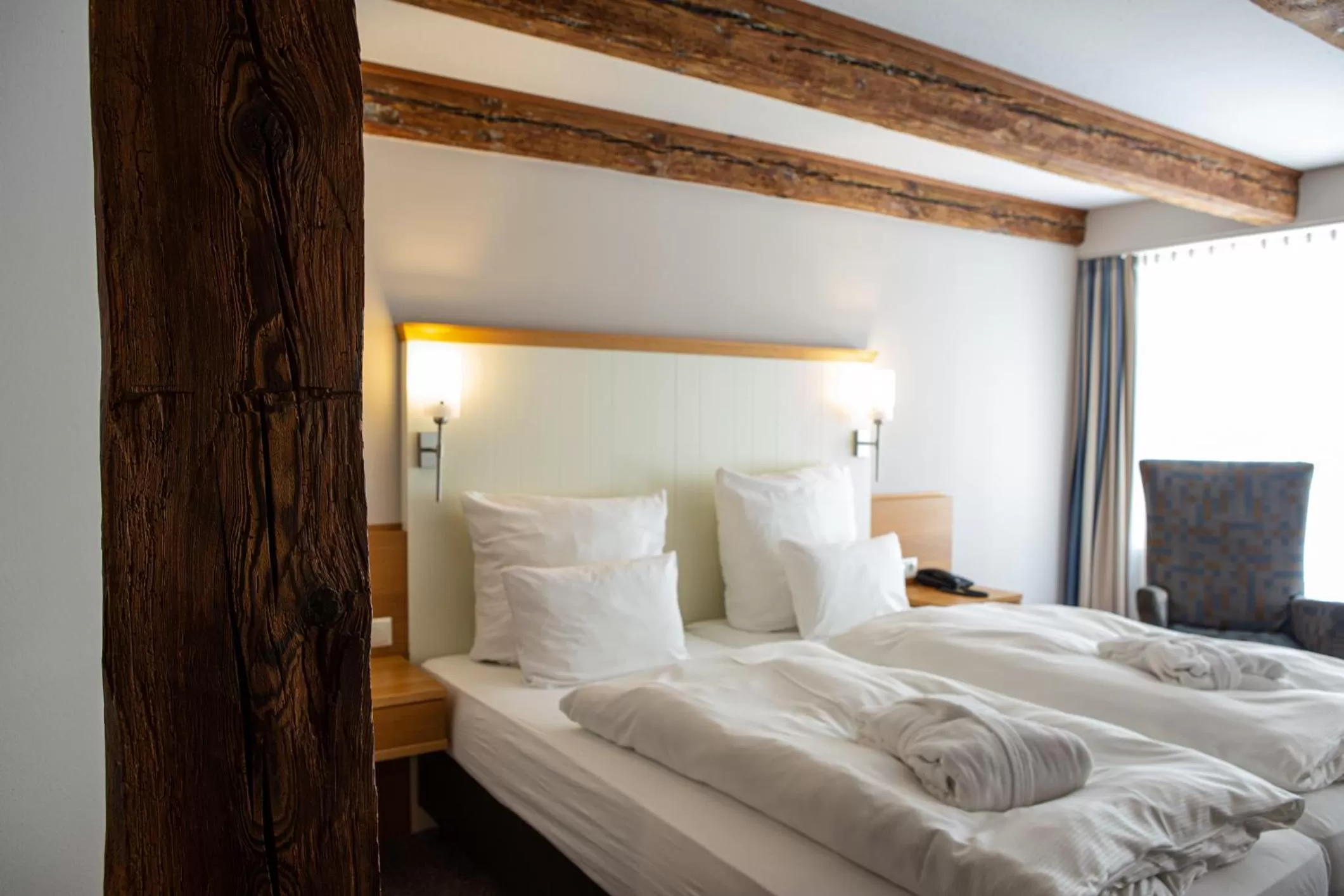 Property building, Bed in Romantik Hotel Aquarium