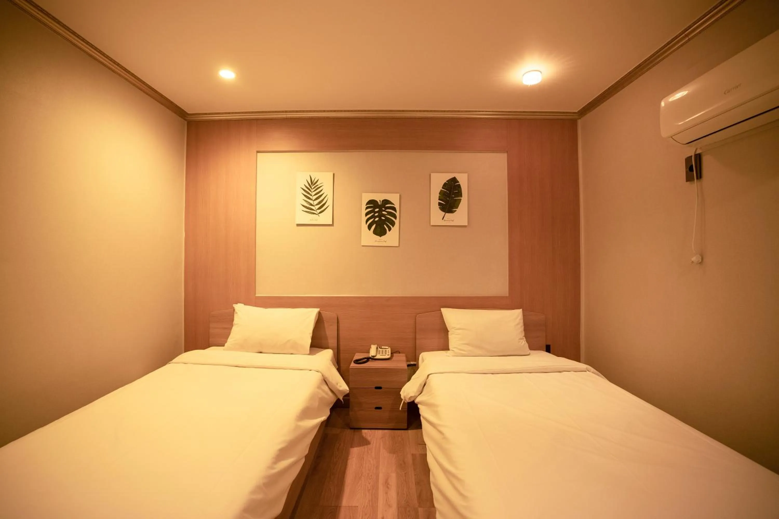 Bed in Jeju Stay Hotel