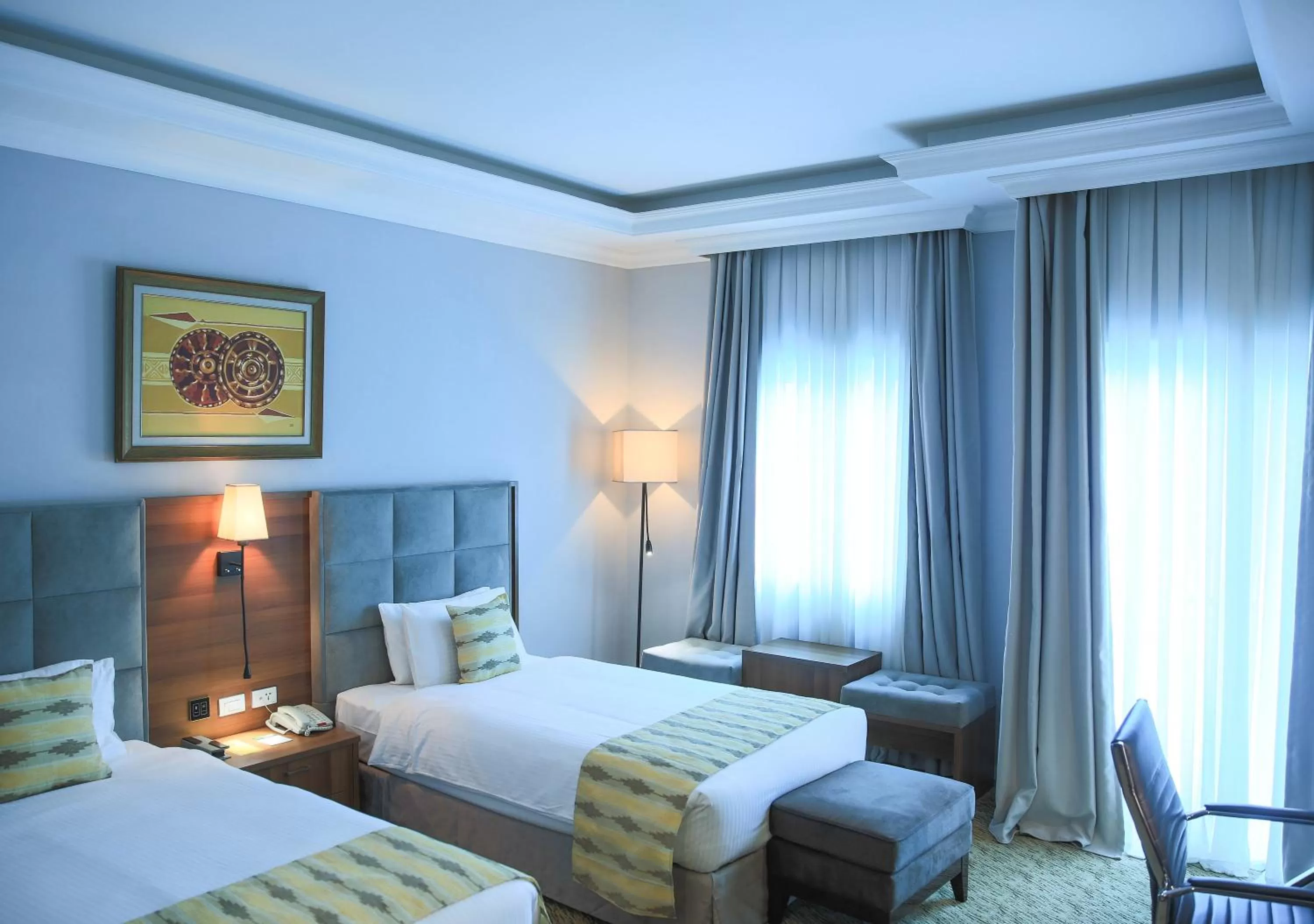 Bed in Swiss Inn Nexus Hotel