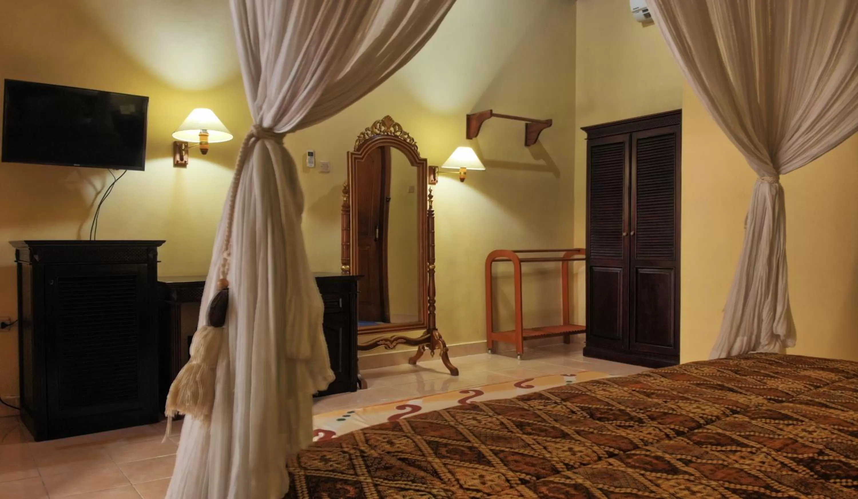 Bed in Masainn Hotel Kuta